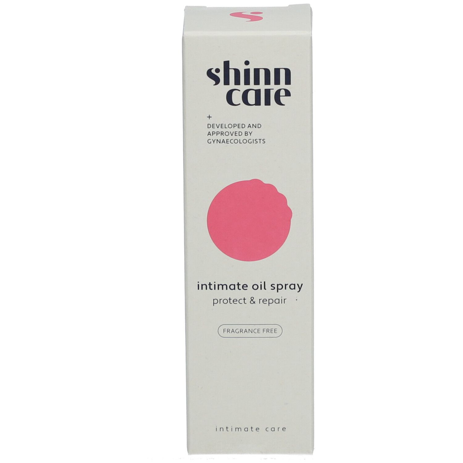 Boîte blanche haute avec cercle rose. Inscription : Shinn Care, Intimate Oil Spray Protect & Repair, Intimate Care.