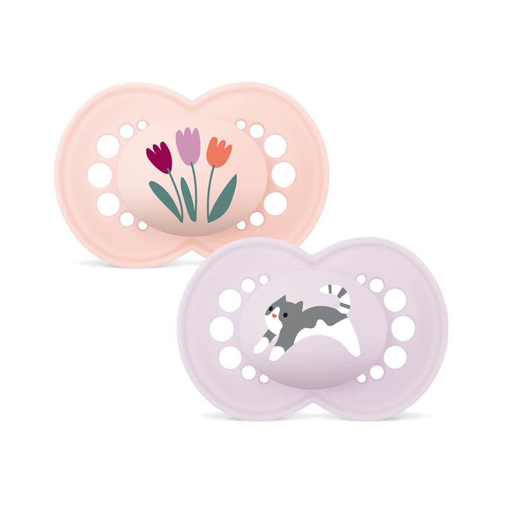 Deux sucettes MAM Original Pure (6-16 mois) rose motif chevreuil et oiseau, et violet motif oiseau, dans leur emballage.