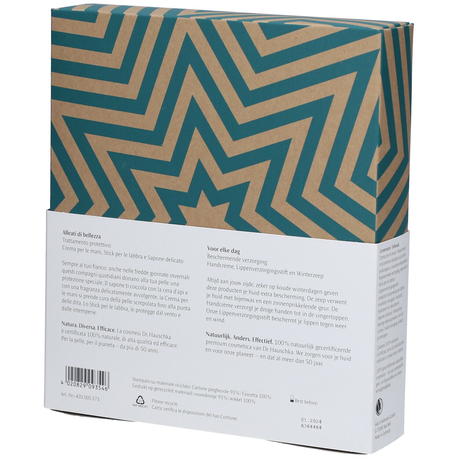 Dos du coffret cadeau avec motif étoiles vert et marron. Texte en allemand, italien, néerlandais. Contient des informations.