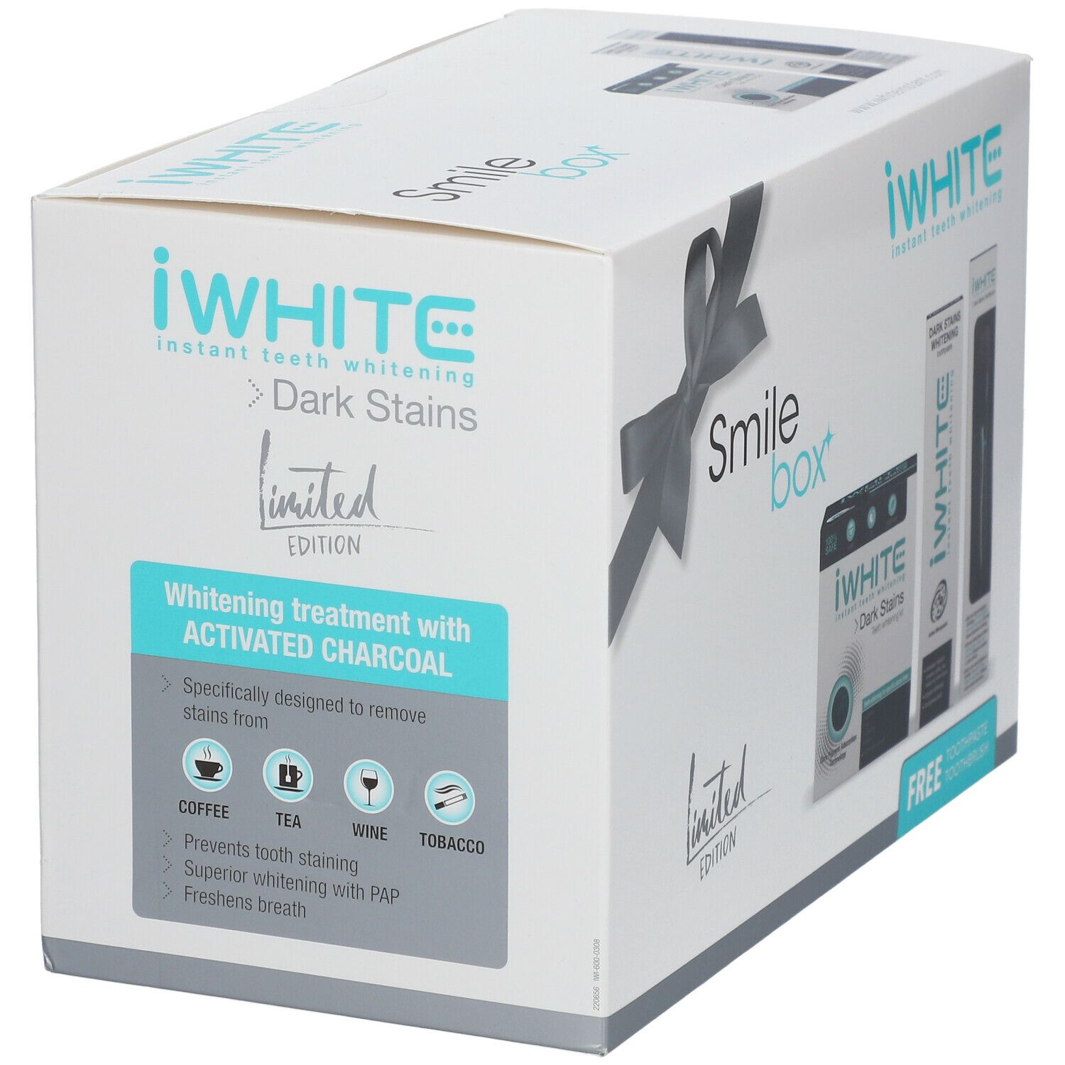 Coffret iWhite Smile Box. Boîte blanche avec ruban. Contient dentifrice et brosse à dents. Inscription : iWhite Dark Stains.