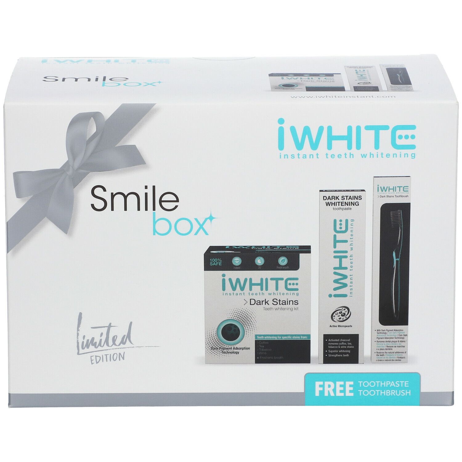 Coffret iWhite Smile Box. Boîte blanche avec ruban. Contient dentifrice et brosse à dents. Inscription : iWhite Dark Stains.