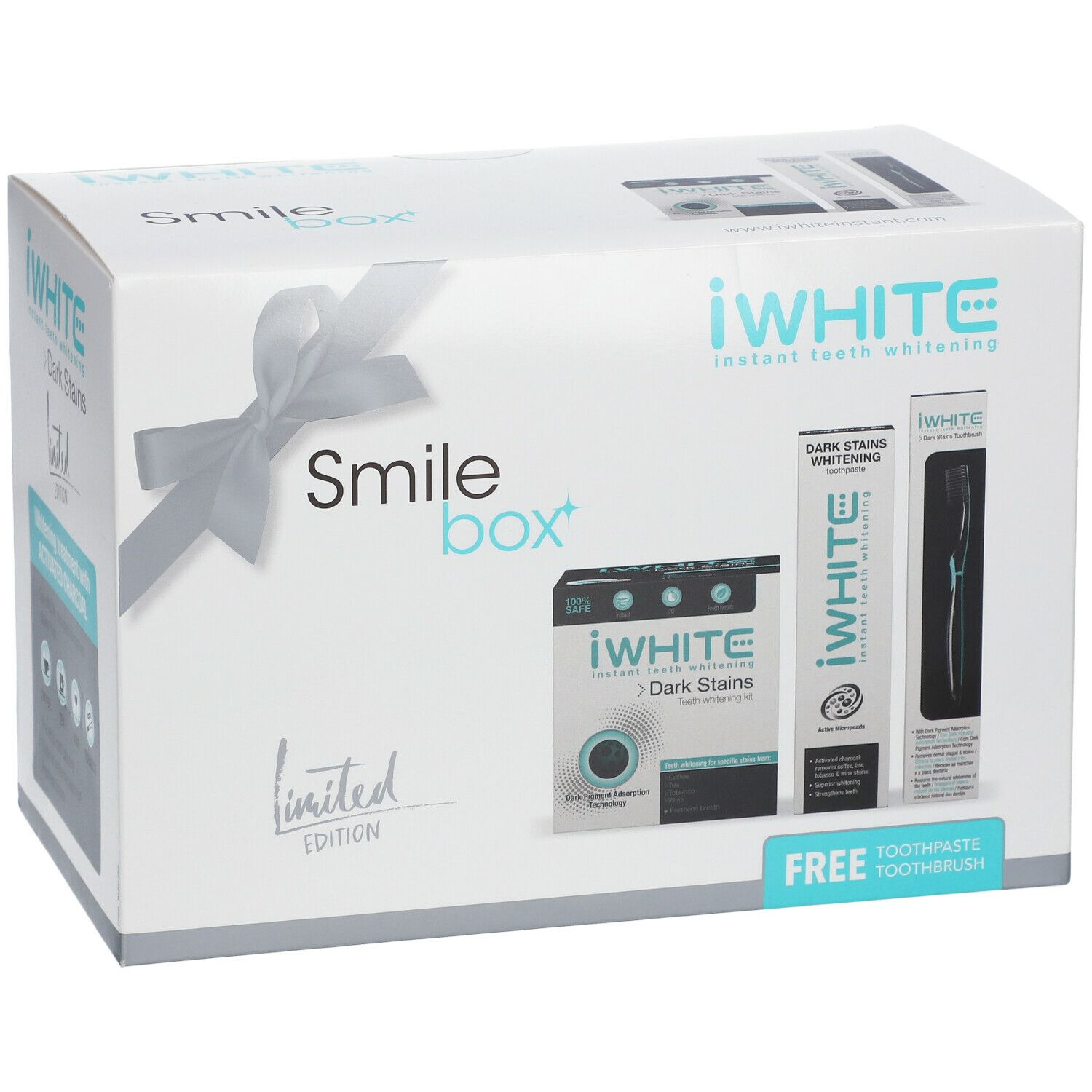 Coffret iWhite Smile Box. Boîte blanche avec ruban. Contient dentifrice et brosse à dents. Inscription : iWhite Dark Stains.