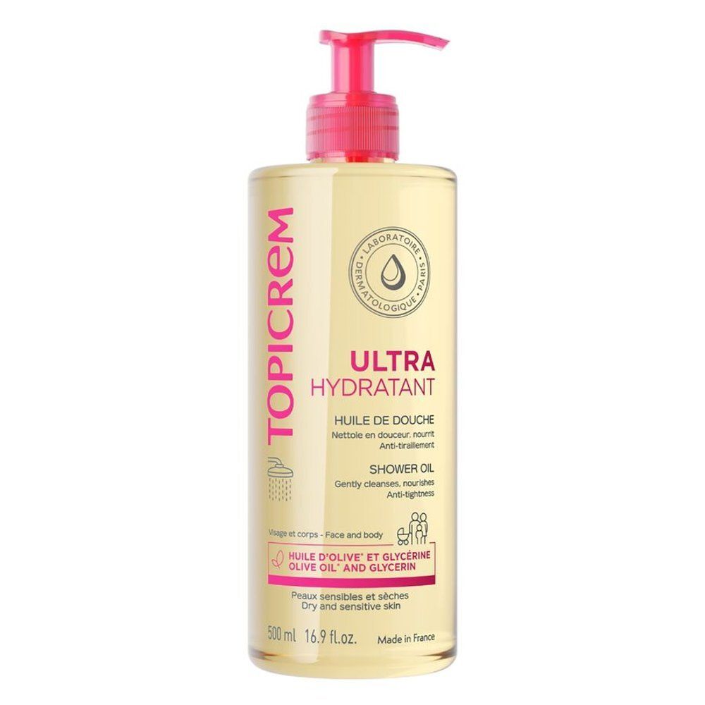 Flacon transparent d'huile de douche Topicrem Ultra Hydratant avec pompe rose. Inscriptions roses et blanches.