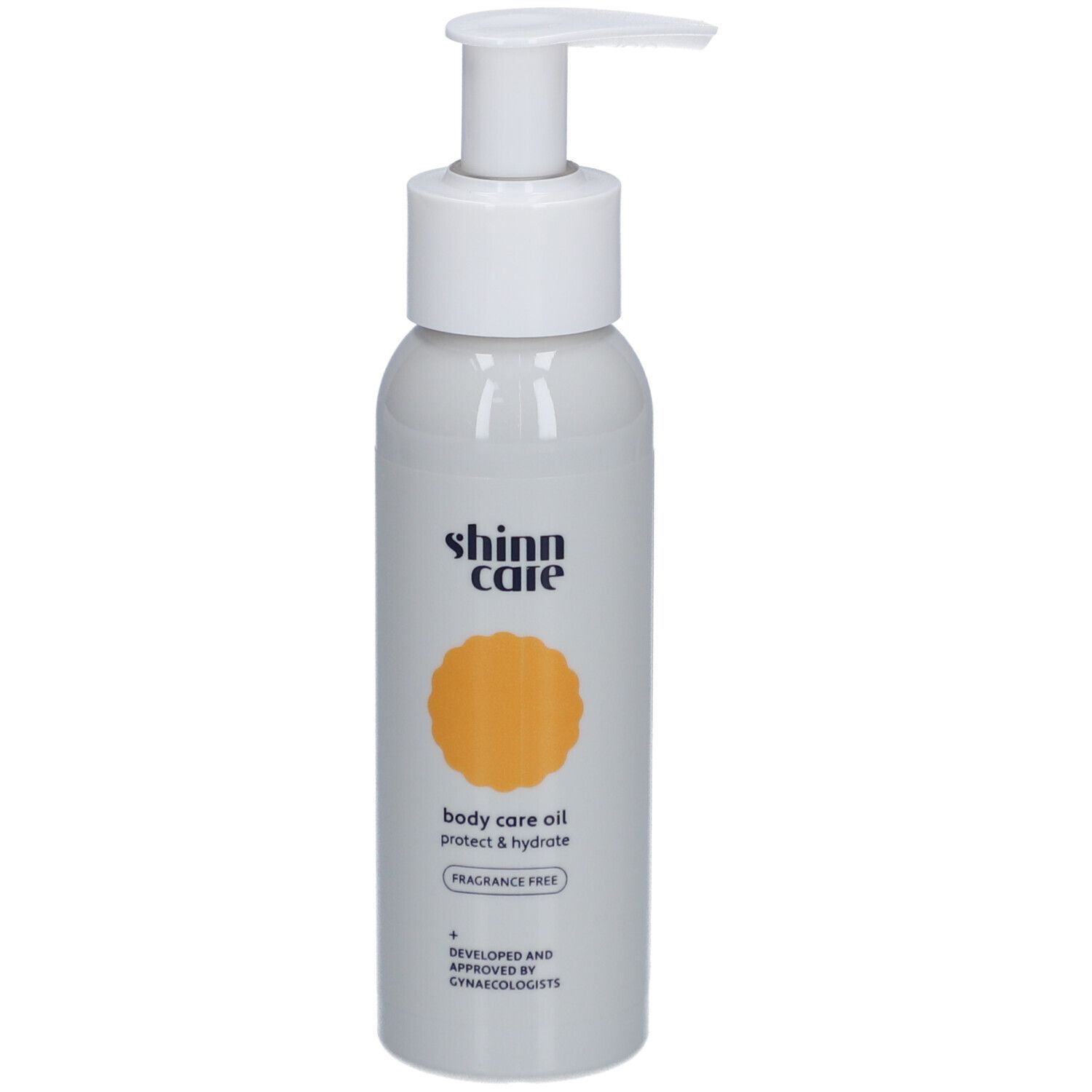 Flacon gris avec pompe blanche. Inscription : shinn care, body care oil, protect & hydrate, sans parfum.