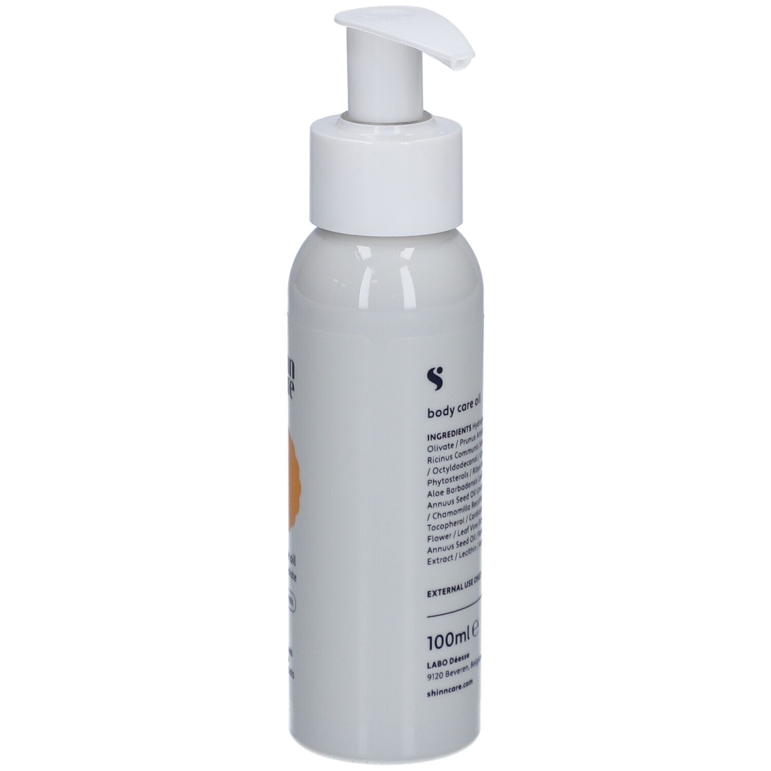 Flacon gris avec pompe blanche. Inscription : shinn care, body care oil, protect & hydrate, sans parfum.