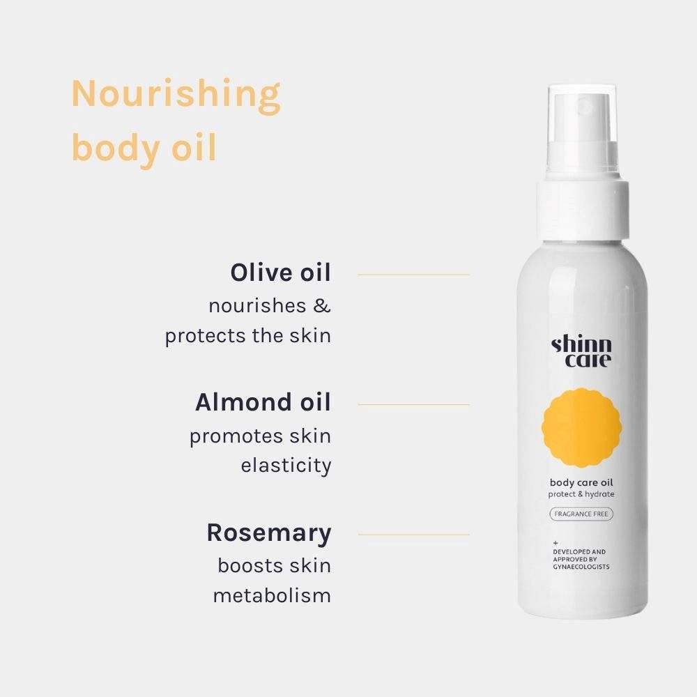 Spray blanc avec texte. Texte : huile d'olive, huile d'amande, romarin. shinn care, body care oil, sans parfum.