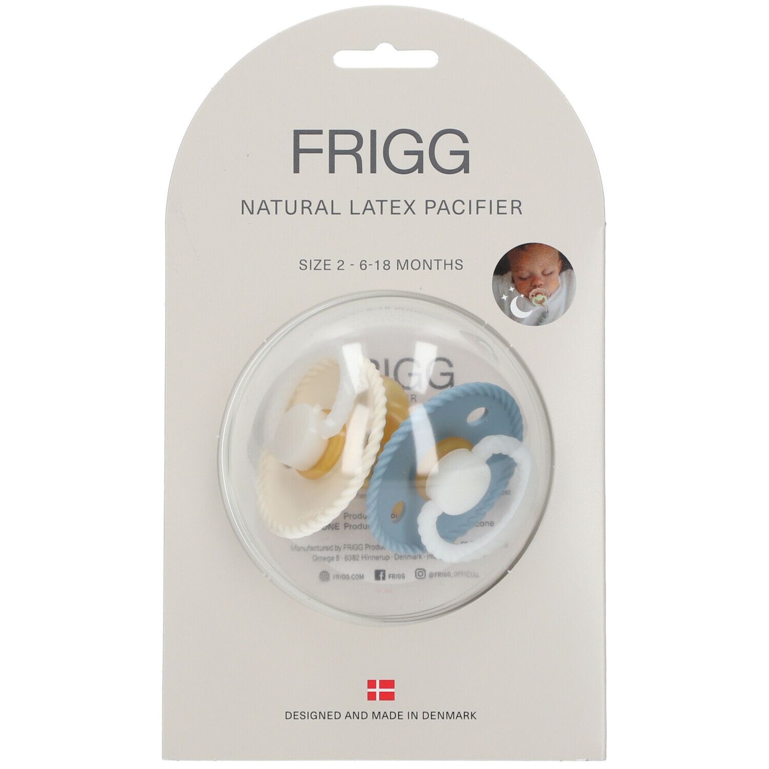 Deux sucettes FRIGG, taille 2, 6-18 mois, en latex naturel, beige et bleu, dans un emballage. Fenêtre transparente.