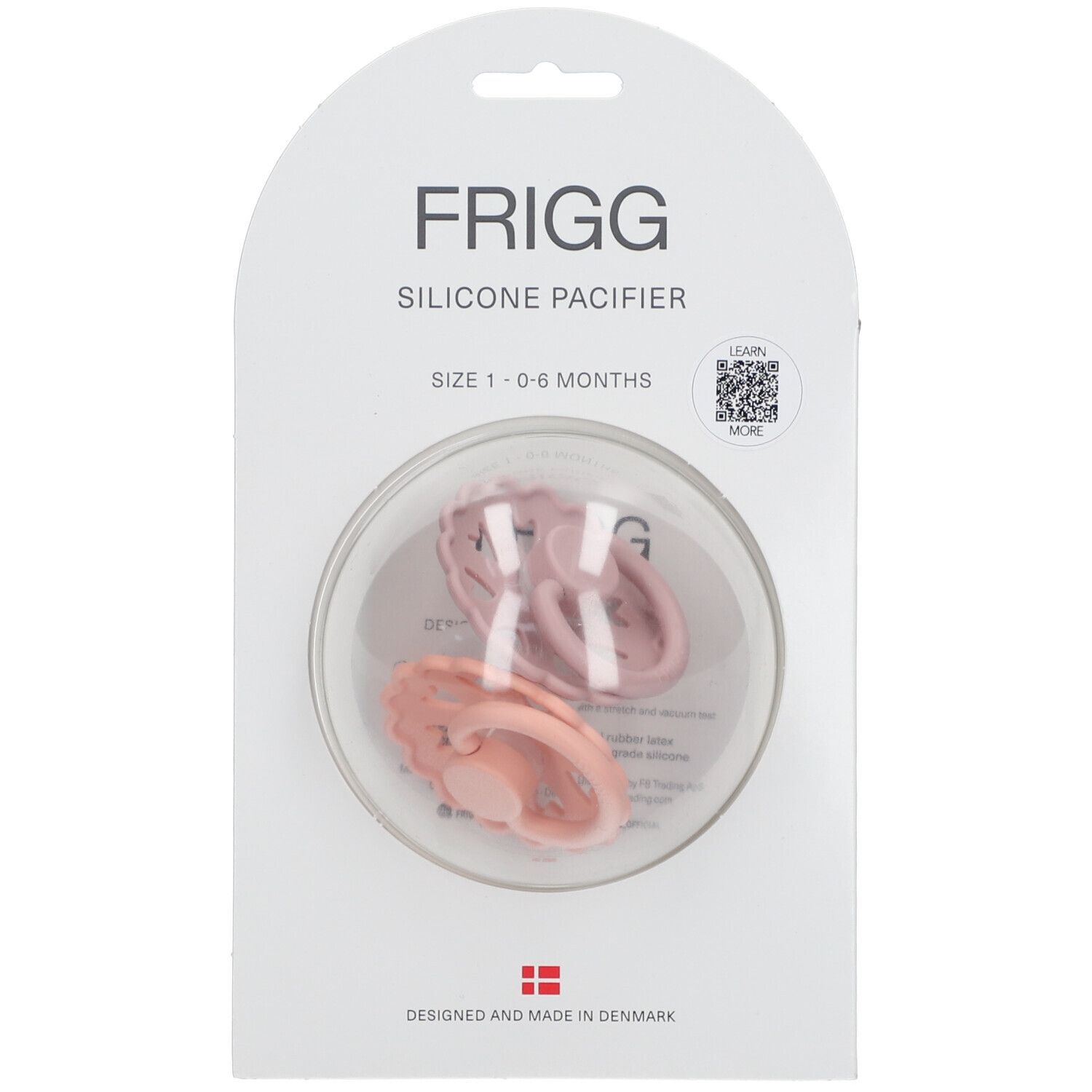 Emballage de deux sucettes FRIGG en silicone. Taille 1, 0-6 mois. Deux sucettes roses visibles.
