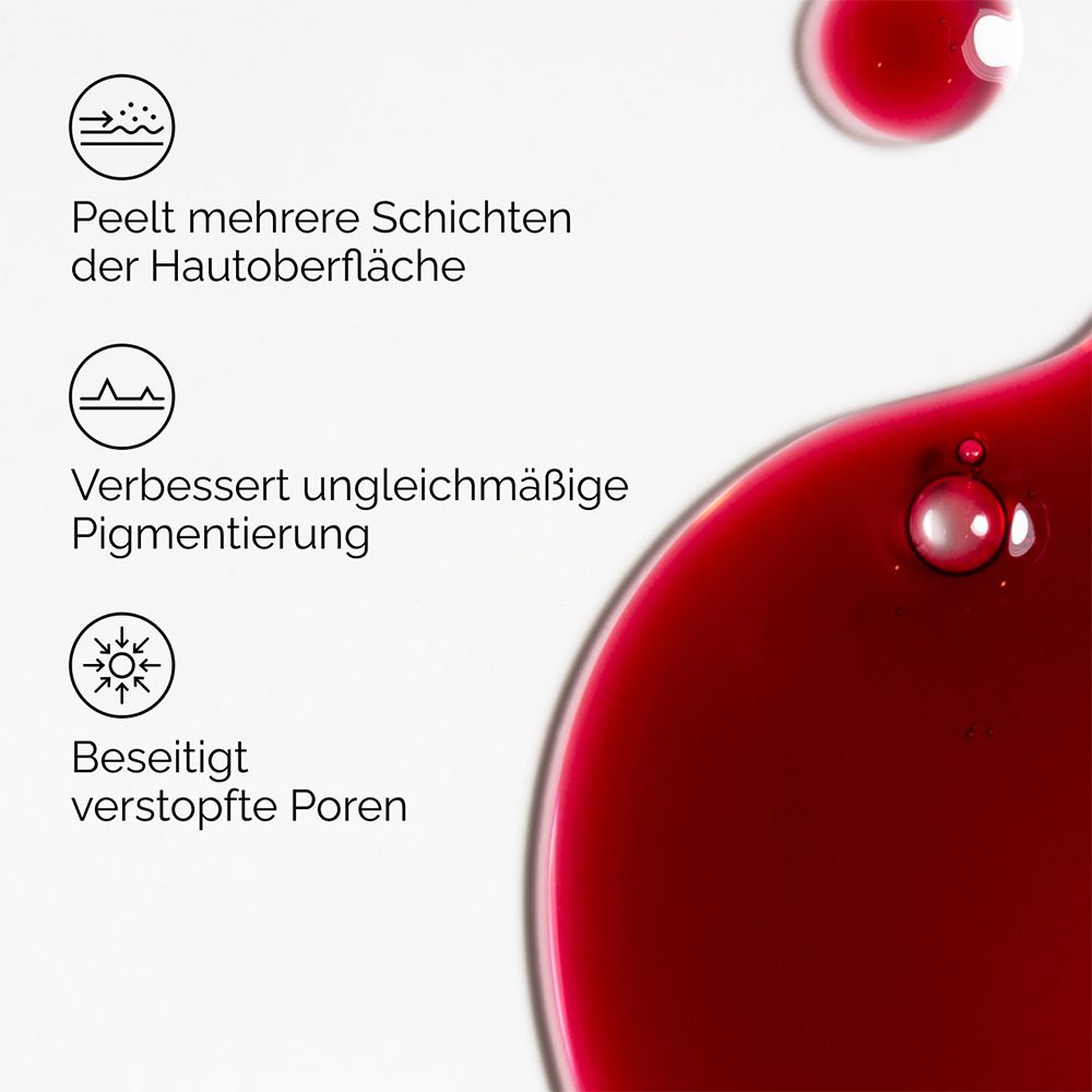 Gros plan de liquide rouge. Texte: Exfolie plusieurs couches, améliore la pigmentation, décongestionne les pores.