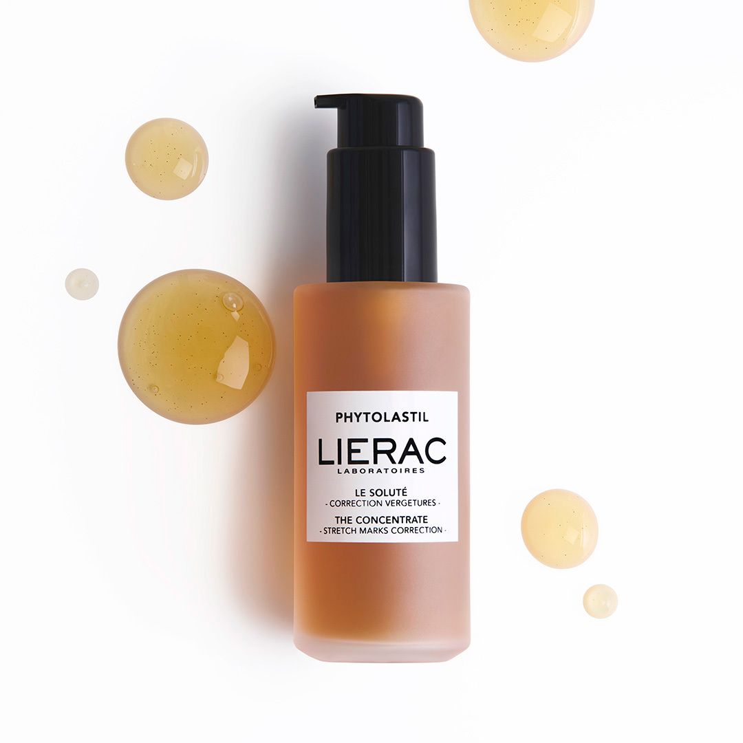 Flacon de produit avec gouttes. Inscription: Lierac, Phytolastil, Le Soluté. Gouttes.