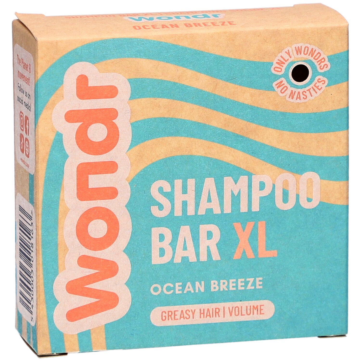 Boîte en carton. Inscription: Wondr, Shampoo Bar XL, Ocean Breeze, cheveux gras. Motif vagues.