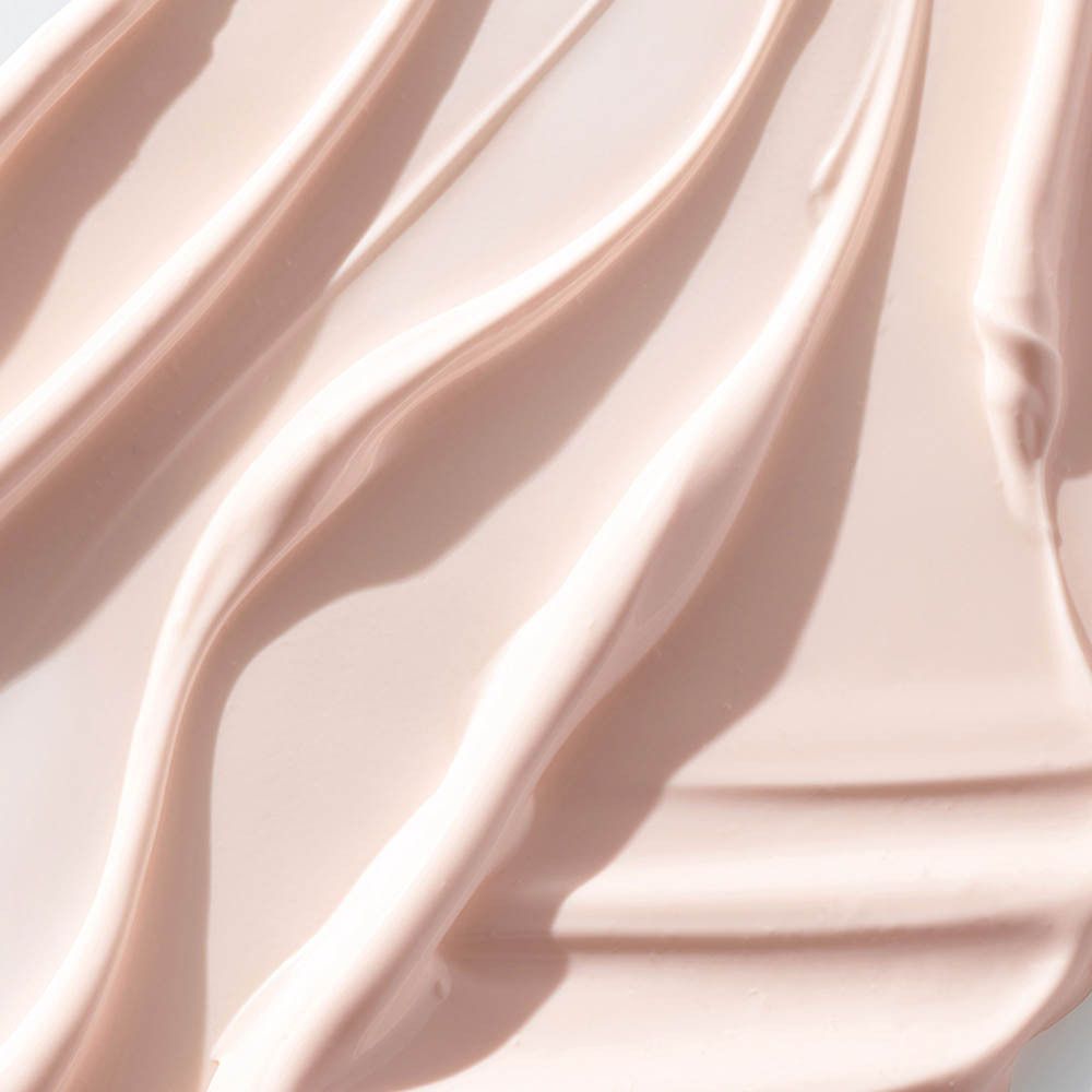 Texture de crème rose de CLINIQUE Moisture Surge SPF 25 Sheer Hydrator.