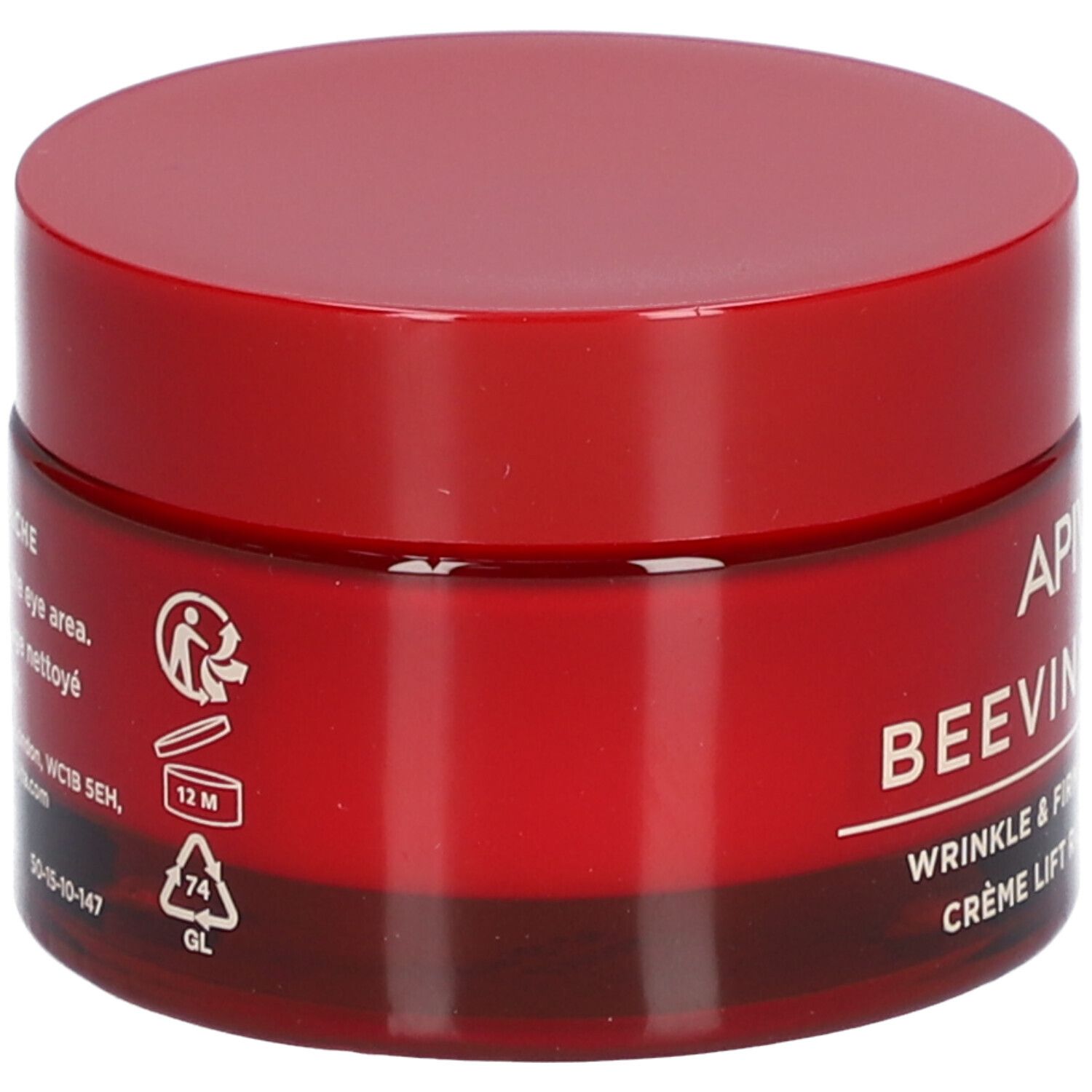 Pot rouge avec couvercle. Inscription : APIVITA BEEVINE ELIXIR. Informations d'utilisation et de recyclage.
