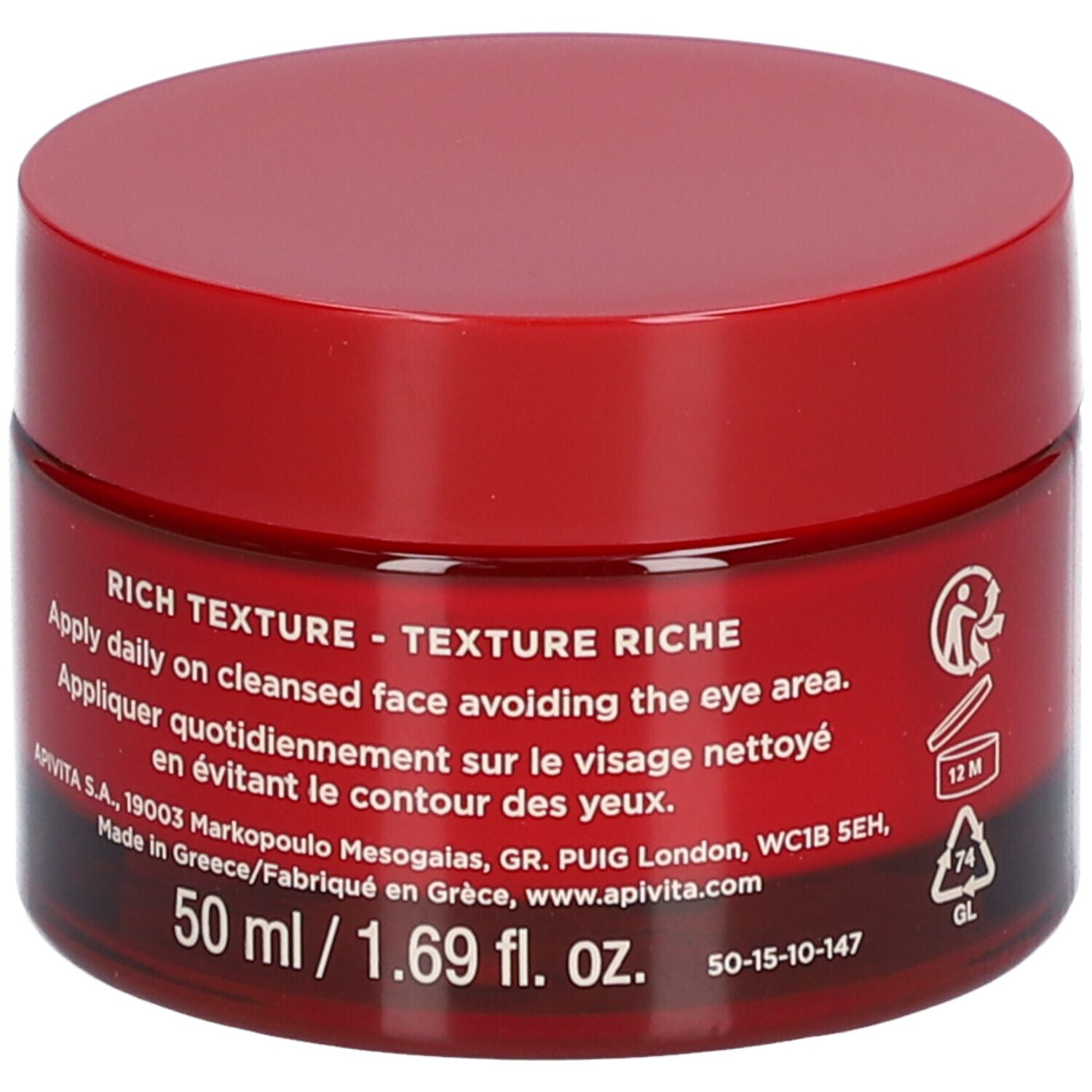 Pot rouge avec couvercle. Inscription : APIVITA BEEVINE ELIXIR. Instructions de texture et d'utilisation.