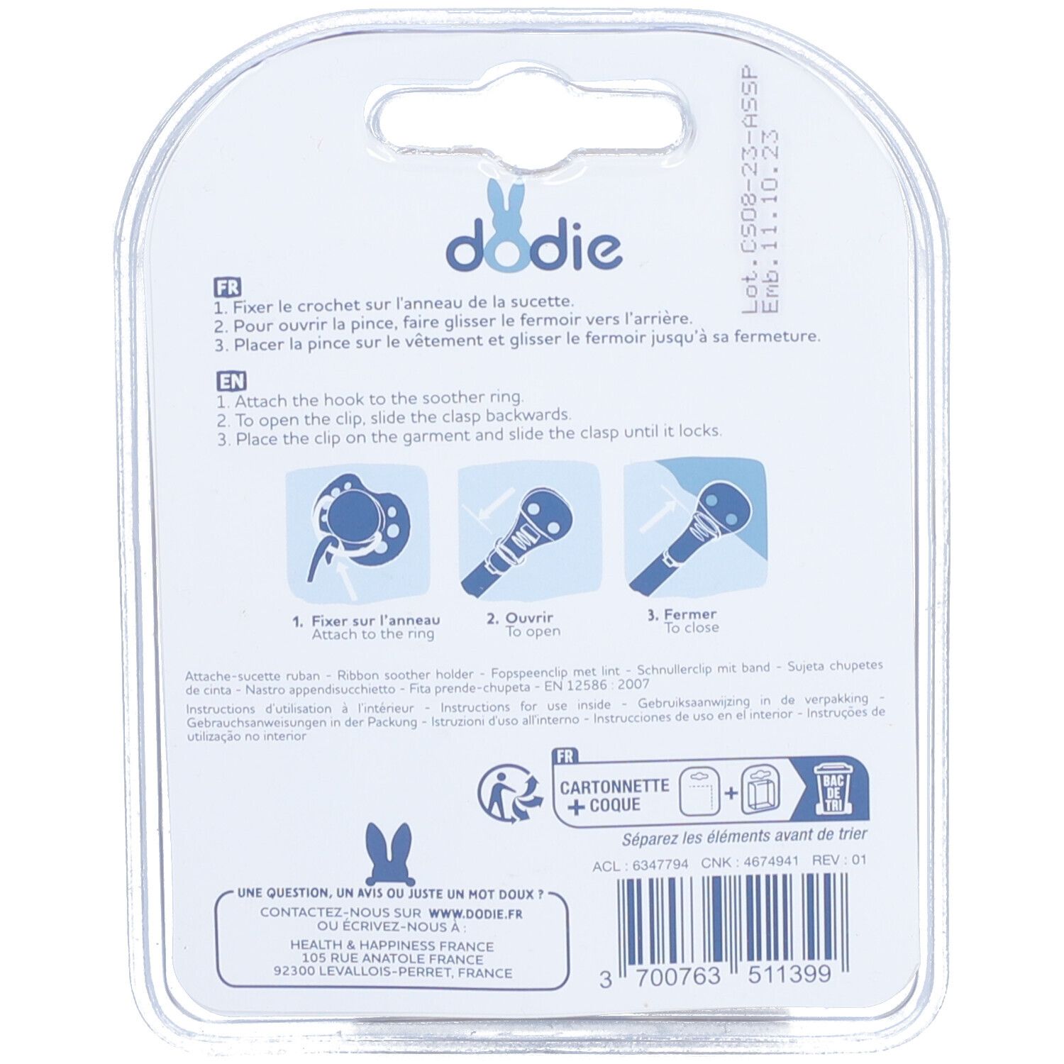 Dos de l'emballage de l'attache-sucette Dodie. Instructions et illustrations. Texte: Dodie, Attache-sucette.