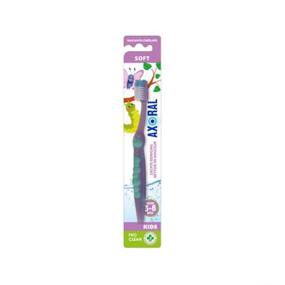 Brosse à dents violette pour enfants avec manche vert. Inscriptions : AXORAL, 3-8 ans, Soft. Emballage avec illustrations.