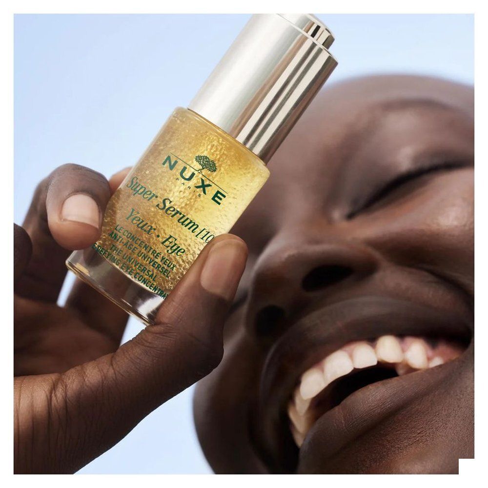 Emballage Nuxe Super Serum pour les yeux, face avant avec design doré circulaire et nom du produit.