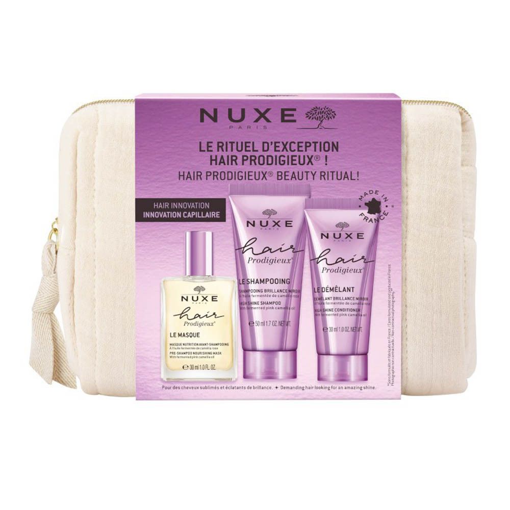 Trousse de produits capillaires NUXE. Contient shampooing, après-shampooing et huile capillaire. Emballage avec nom et logo.