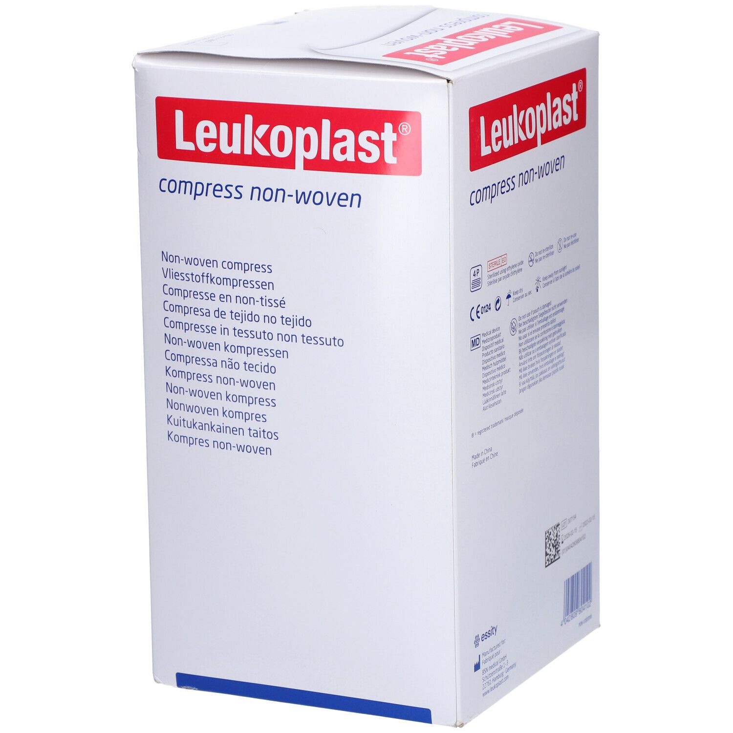 Boîte blanche avec texte rouge Leukoplast compress non-woven. Désignations multilingues du produit.