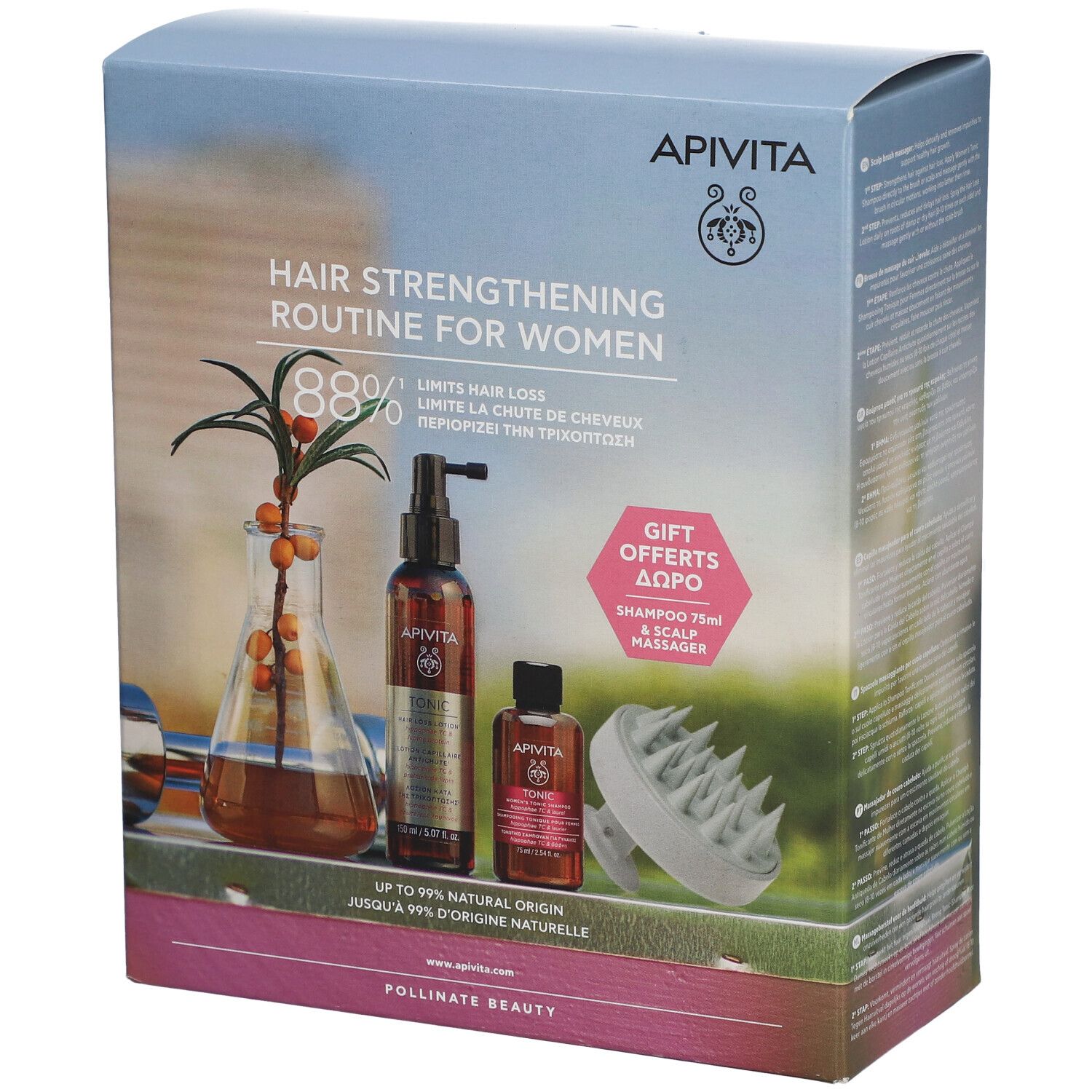 Coffret de soins capillaires. Contient des flacons, une brosse de massage et du texte. Marque : Apivita.
