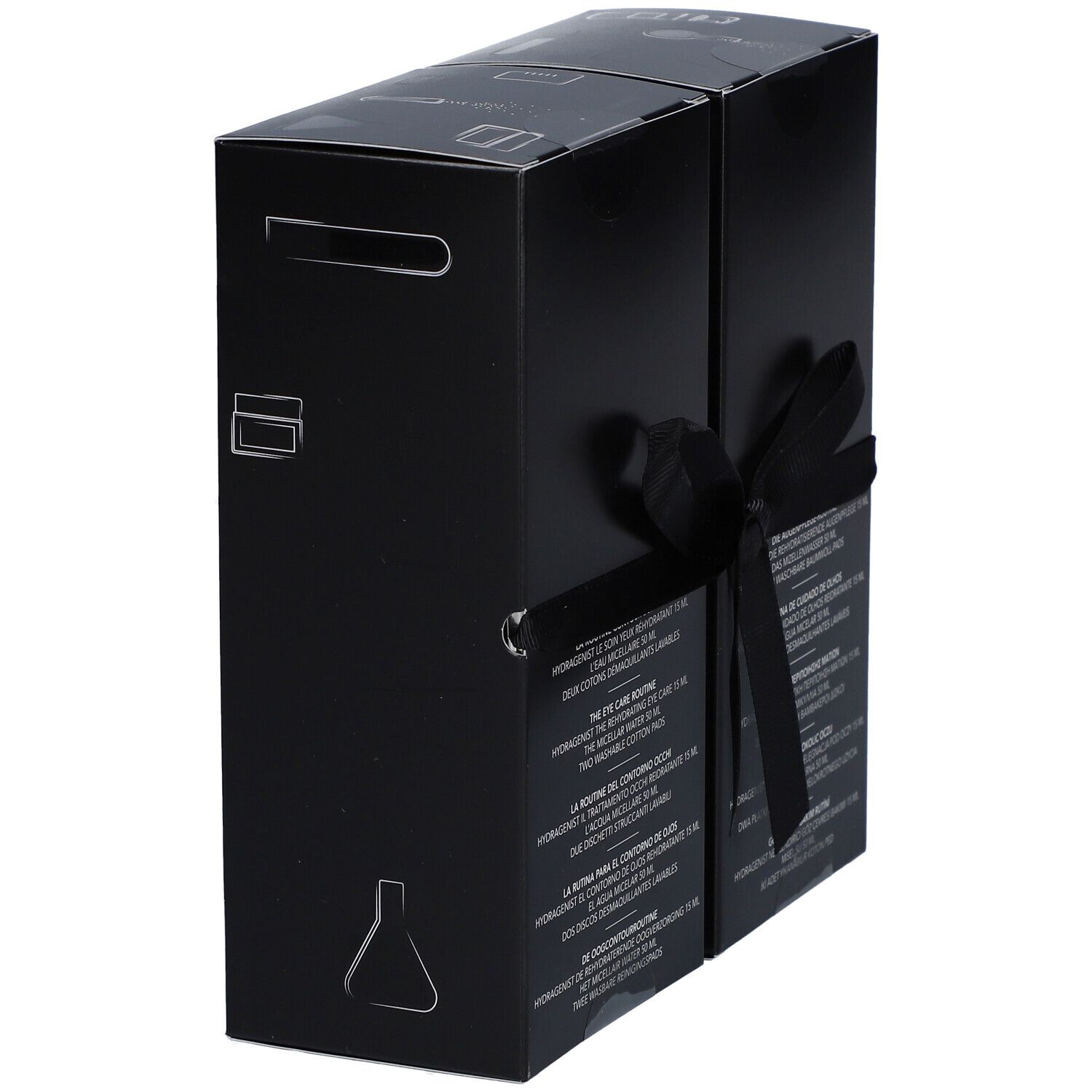 Coffret cadeau noir, noué avec un ruban noir. Contient soin des yeux et eau micellaire. Logo sur l'emballage.