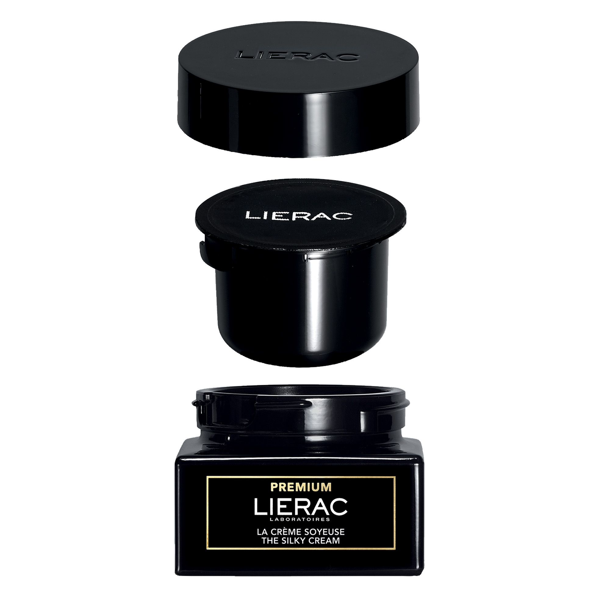 Pot et couvercles noirs, partiellement ouverts. Nom du produit et marque visibles.