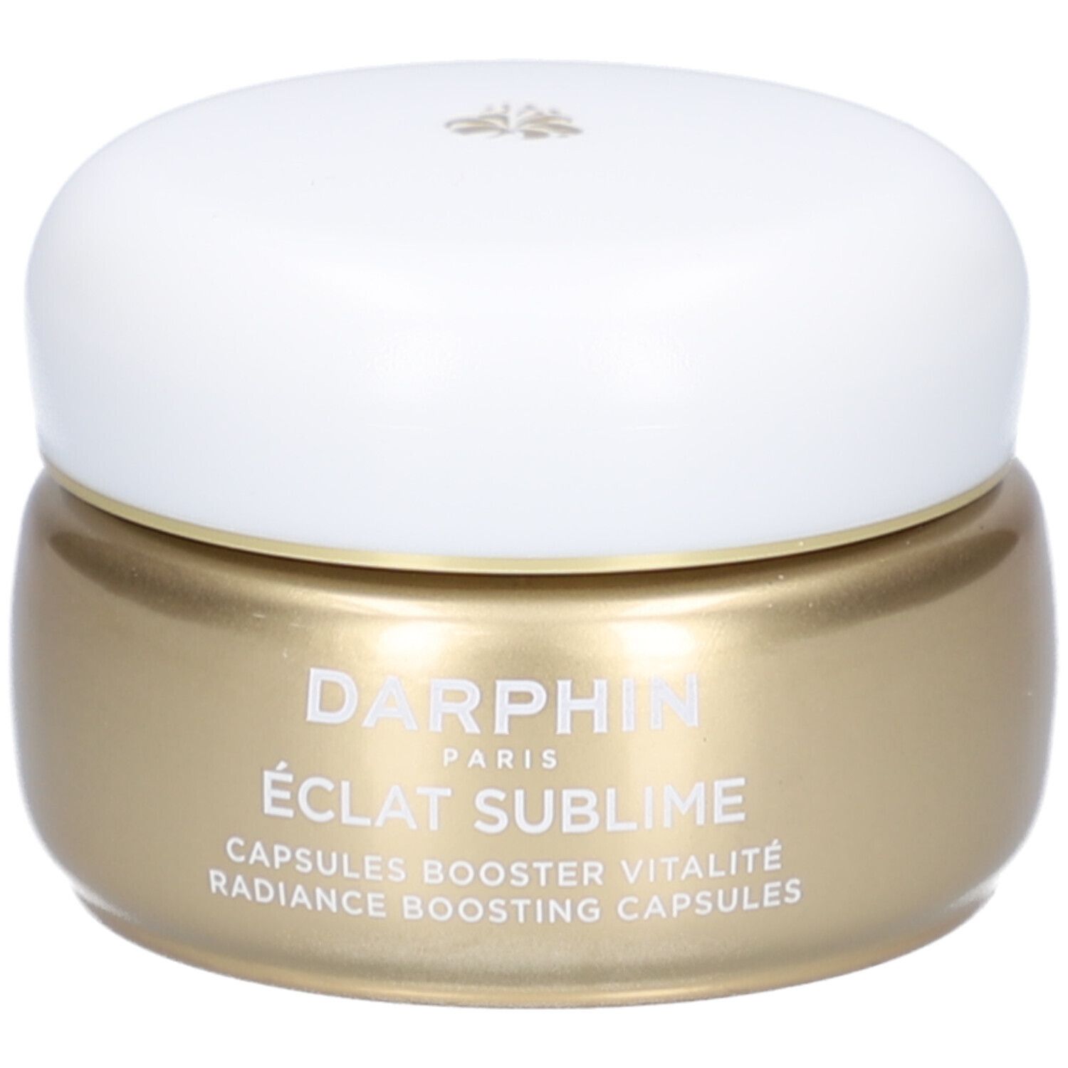 Pot doré avec couvercle blanc. Inscription: Darphin, Éclat Sublime. Capsules éclat.