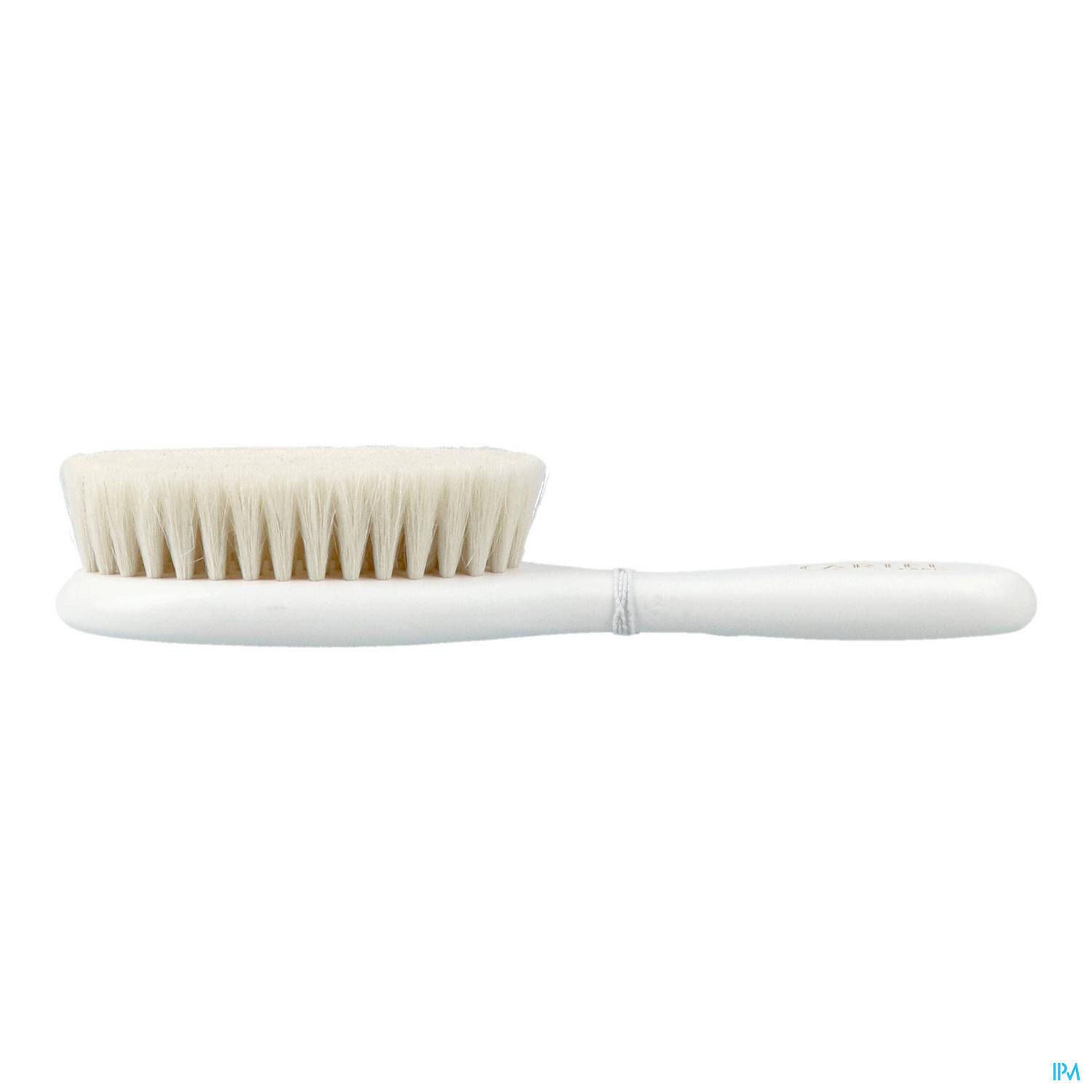 Brosse à cheveux bébé blanche. Tête ovale, poils clairs, manche blanc.