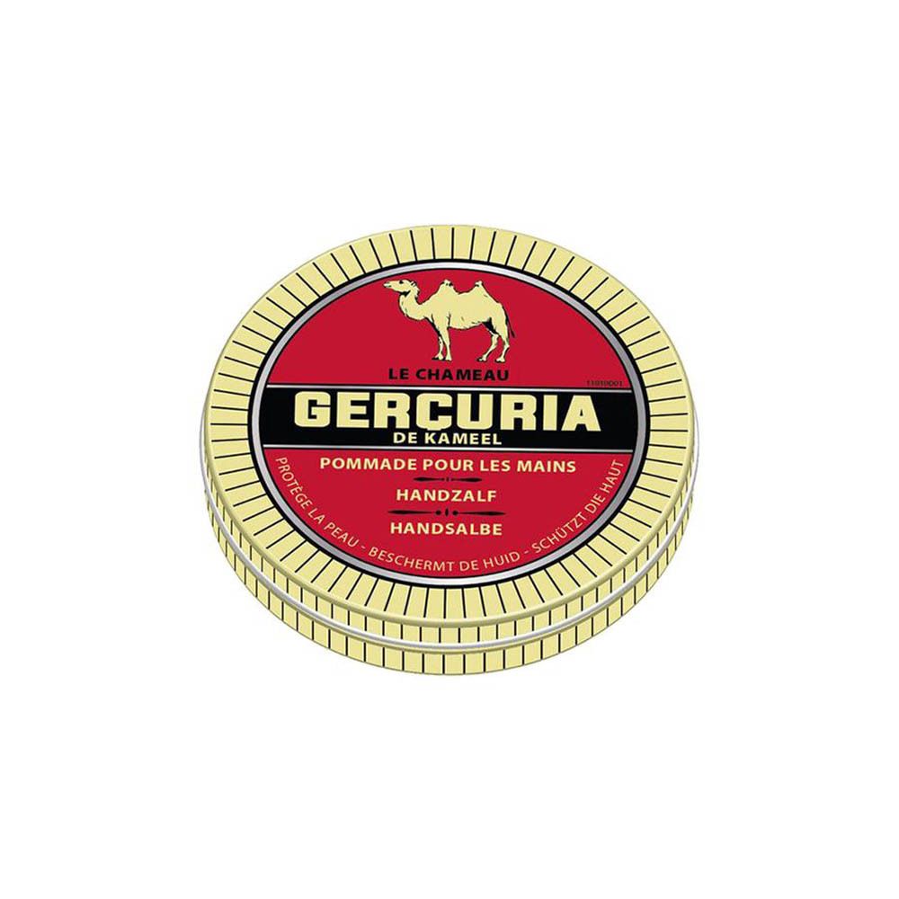 Boîte ronde avec couvercle rouge, illustration de chameau et texte GERCURIA. Inscription : Pommade pour les Mains, Handzalf, Handsalbe. Vue en perspective.