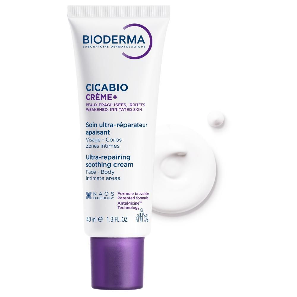 Produit et crème. Tube blanc, bouchon violet. Crème à côté. Inscriptions: BIODERMA, Cicabio Crème+.