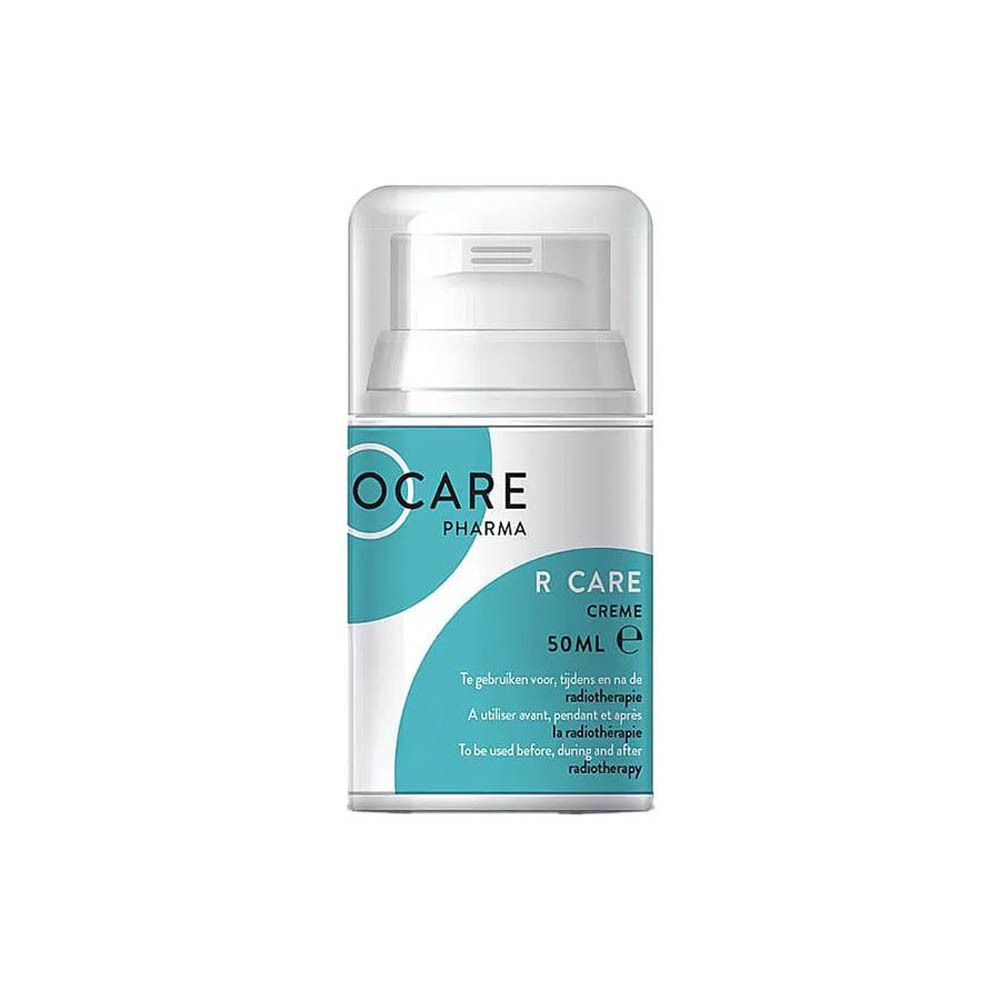 Flacon blanc Ocare R Care Crème avec pompe. Étiquette turquoise et blanche avec nom du produit et texte multilingue.