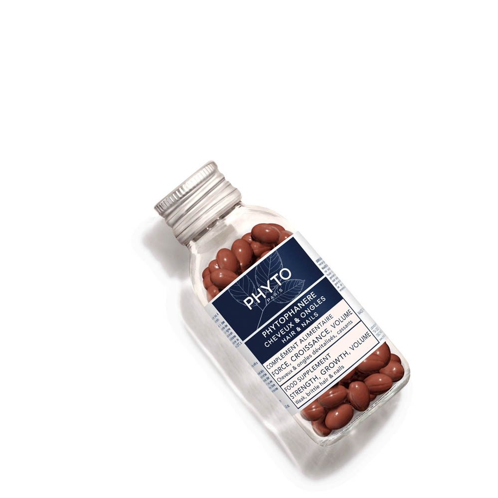 Dos de l'emballage du produit. Texte et un flacon de gélules.