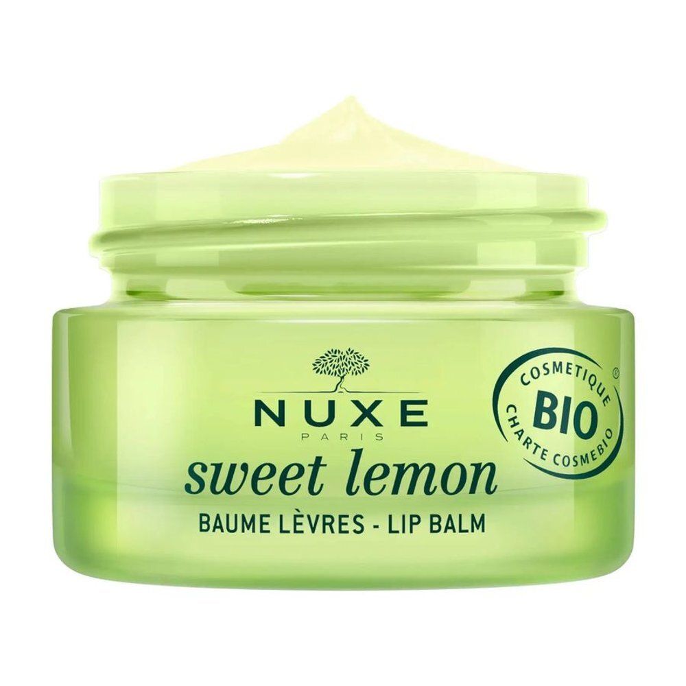 Baume à lèvres Nuxe Sweet Lemon dans un pot vert avec couvercle et sceau BIO.