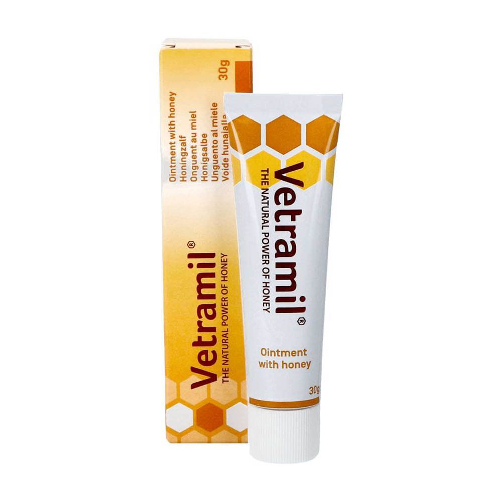 Tube et boîte de crème Vetramil. Tube et boîte avec des accents jaunes. Inscription : Ointment with honey. 30g.