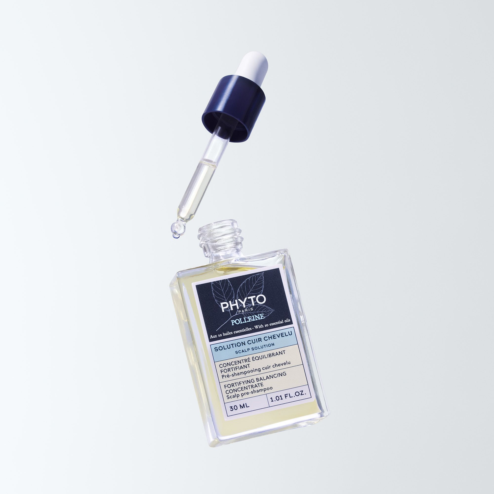 Flacon avec pipette. Inscription: Phyto Polleine Solution Cuir Chevelu.