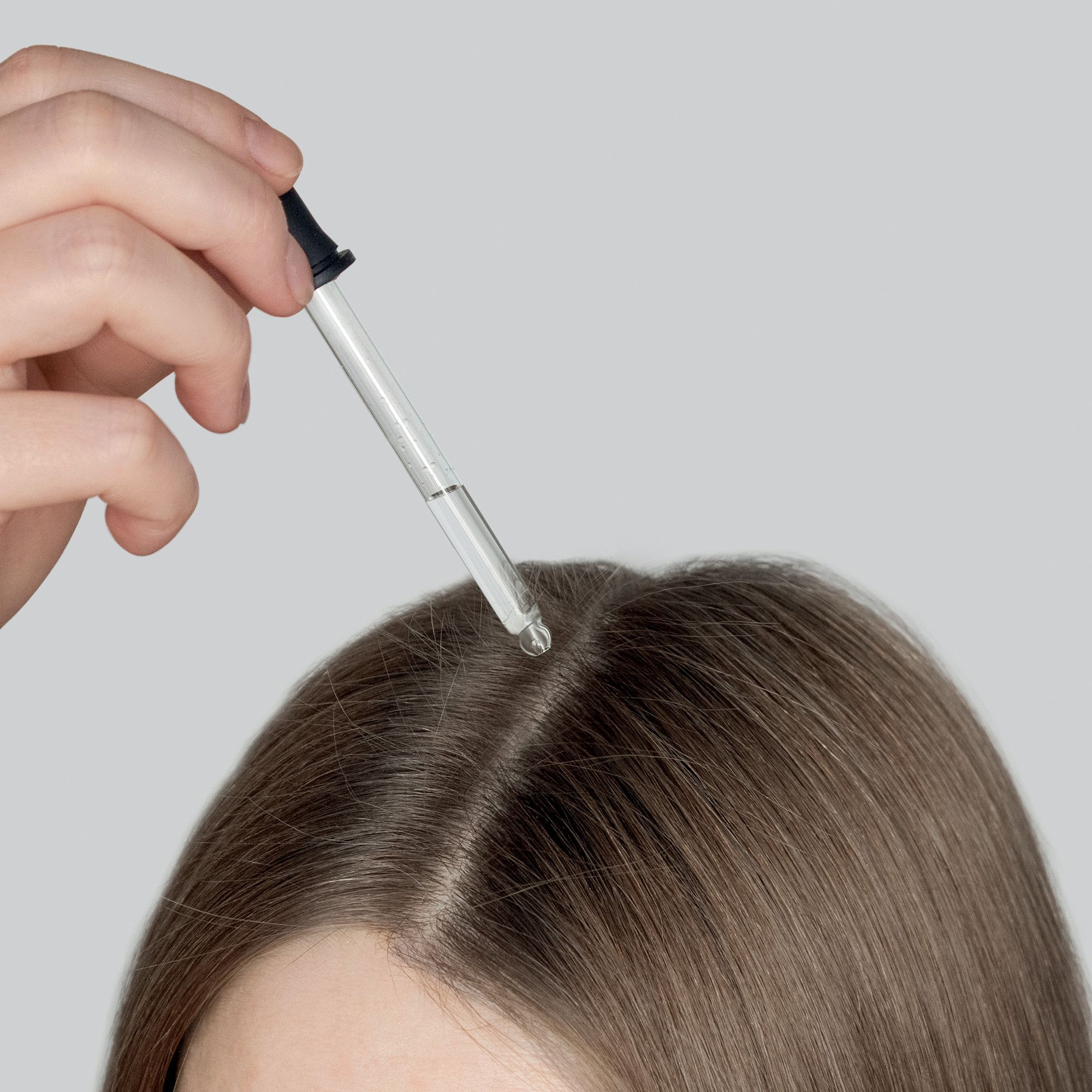 Flacon avec pipette et emballage. Inscription: Phyto Polleine Solution Cuir Chevelu.