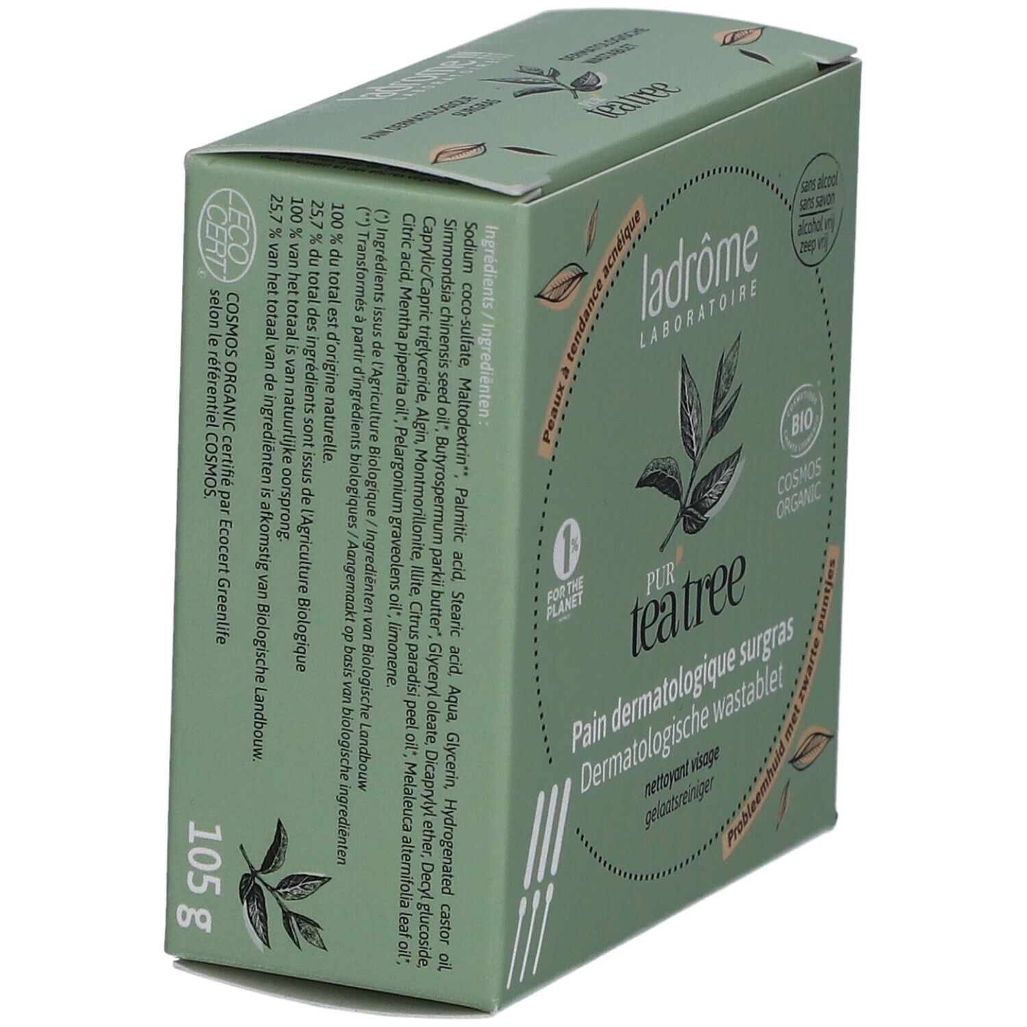 Boîte verte, nom et logo du produit. Texte : Pur Tea Tree, Pain Dermatologique surgras, Dermatologische wastablet. 105g.
