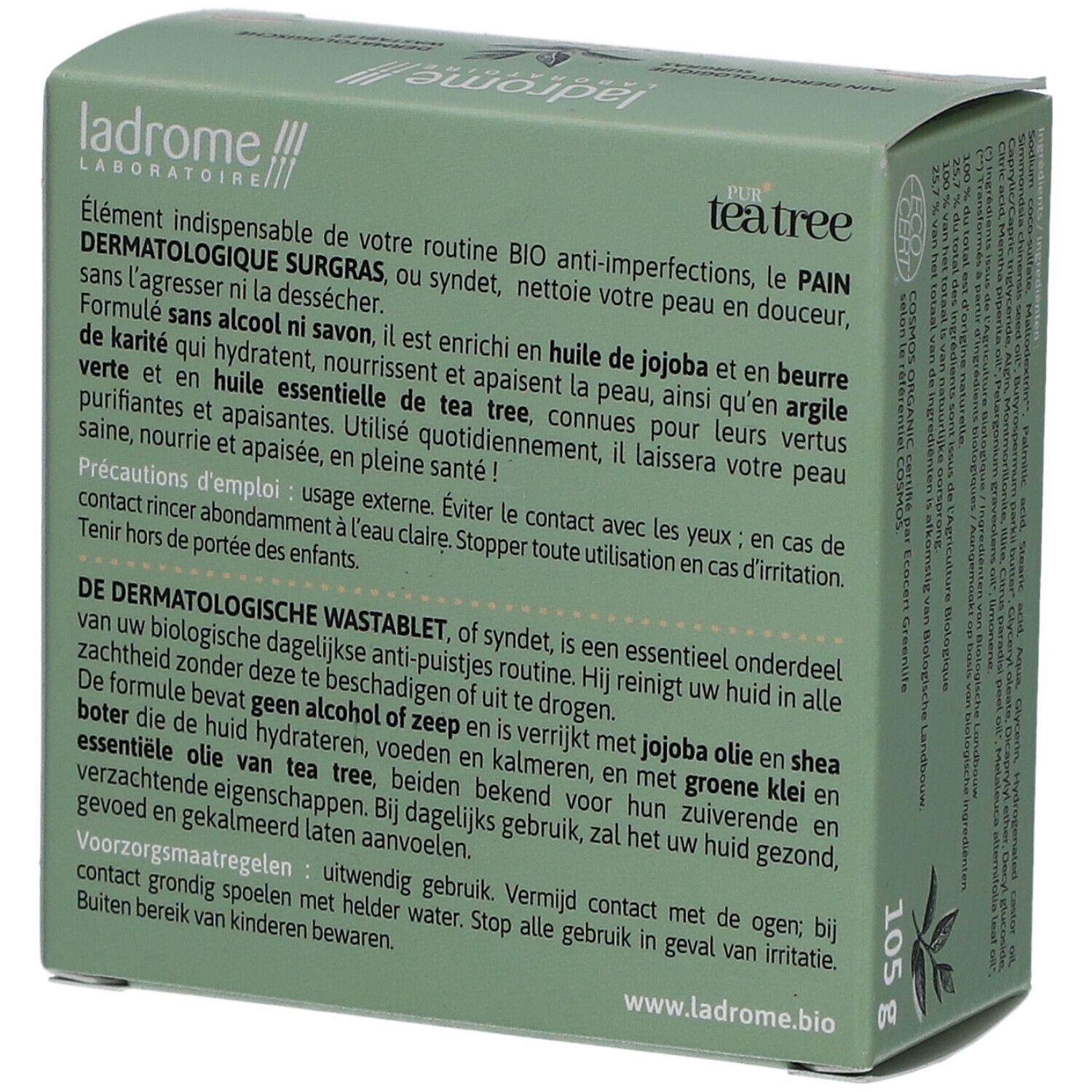 Boîte verte, nom et logo du produit. Texte : Pur Tea Tree, Pain Dermatologique surgras, Dermatologische wastablet. 105g.