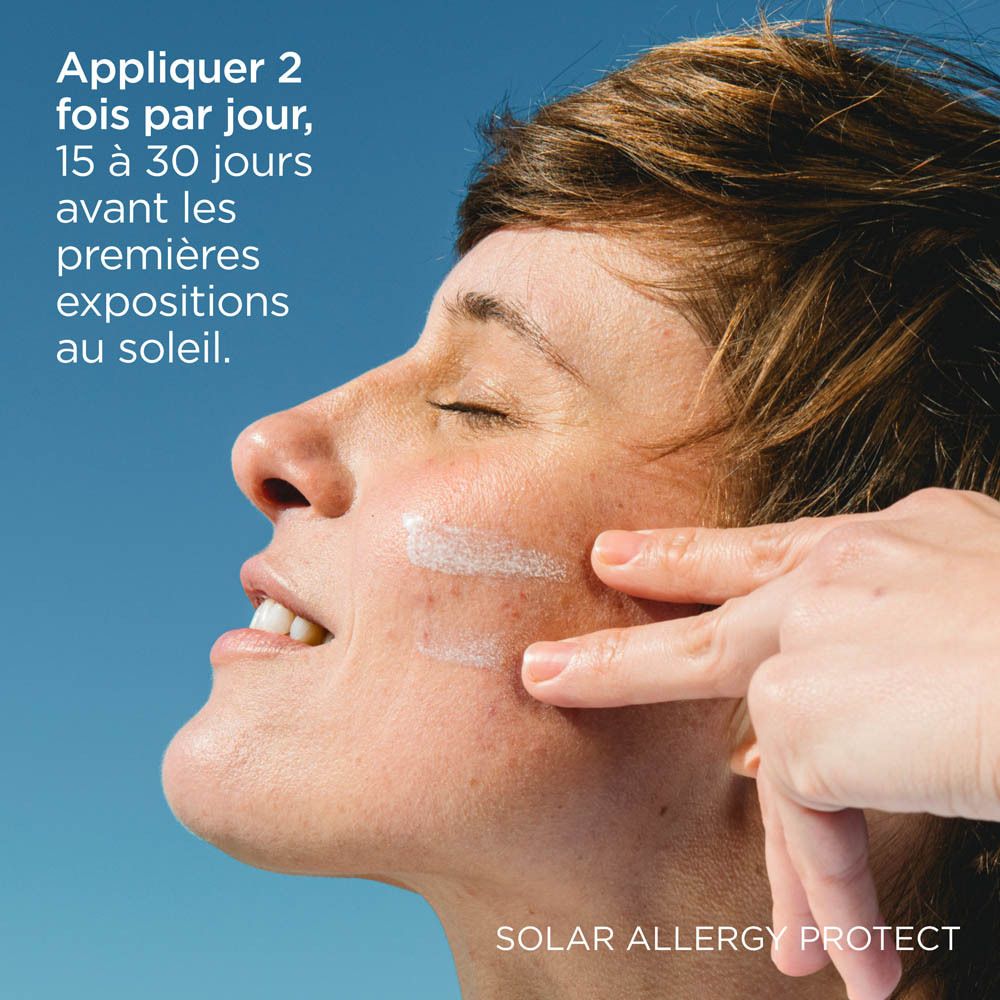 Flacon blanc ISDIN. Texte: FOTULTRA 100, Solar Allergy Protect, SPF50+. Protection solaire.