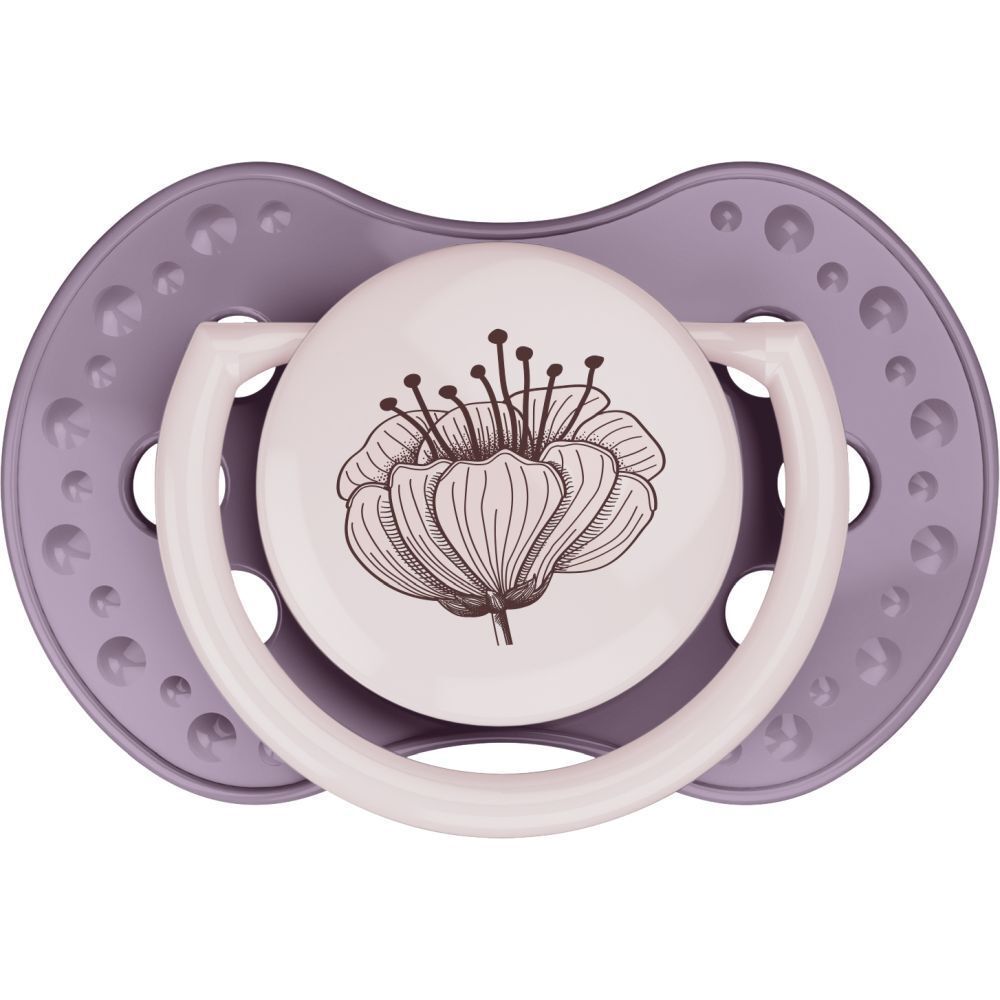 Sucette lilas avec motif floral. Forme ronde avec poignée et petits trous.
