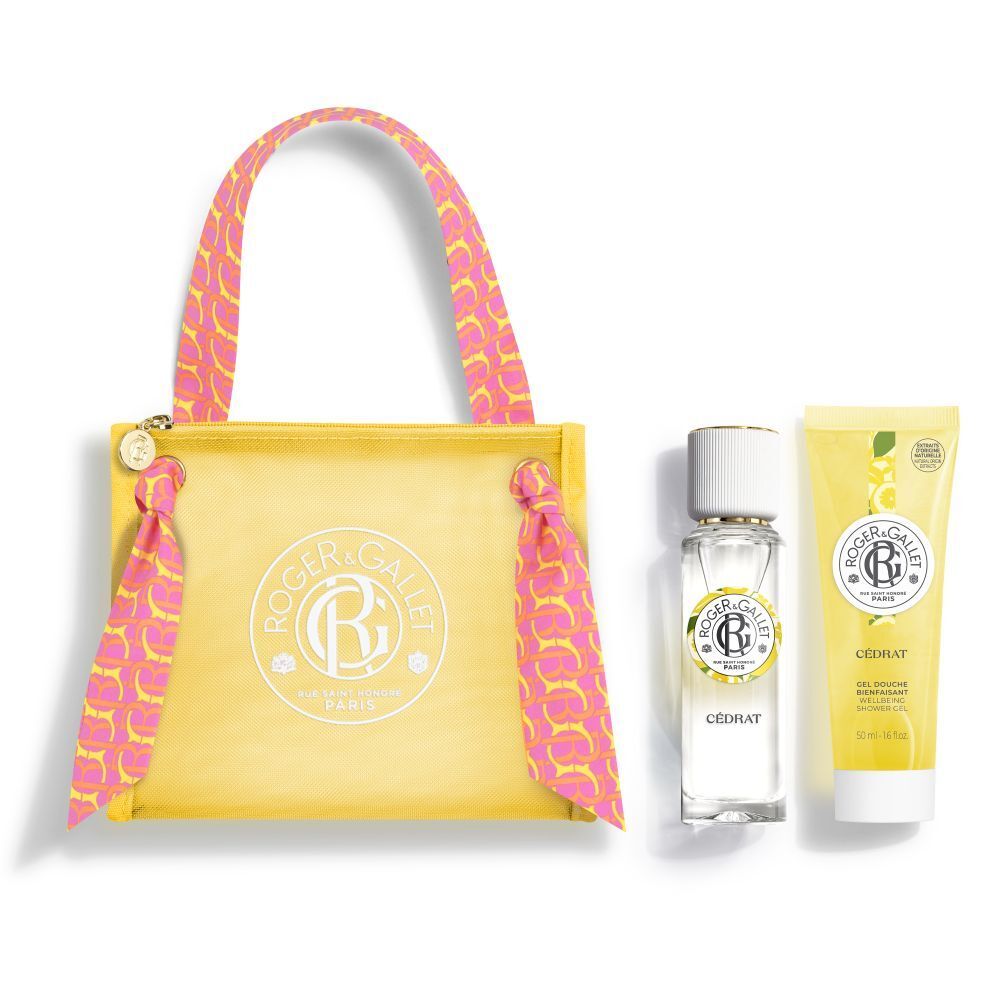Trousse jaune avec anses et rubans. Contient flacon et tube. Logo et texte visibles.