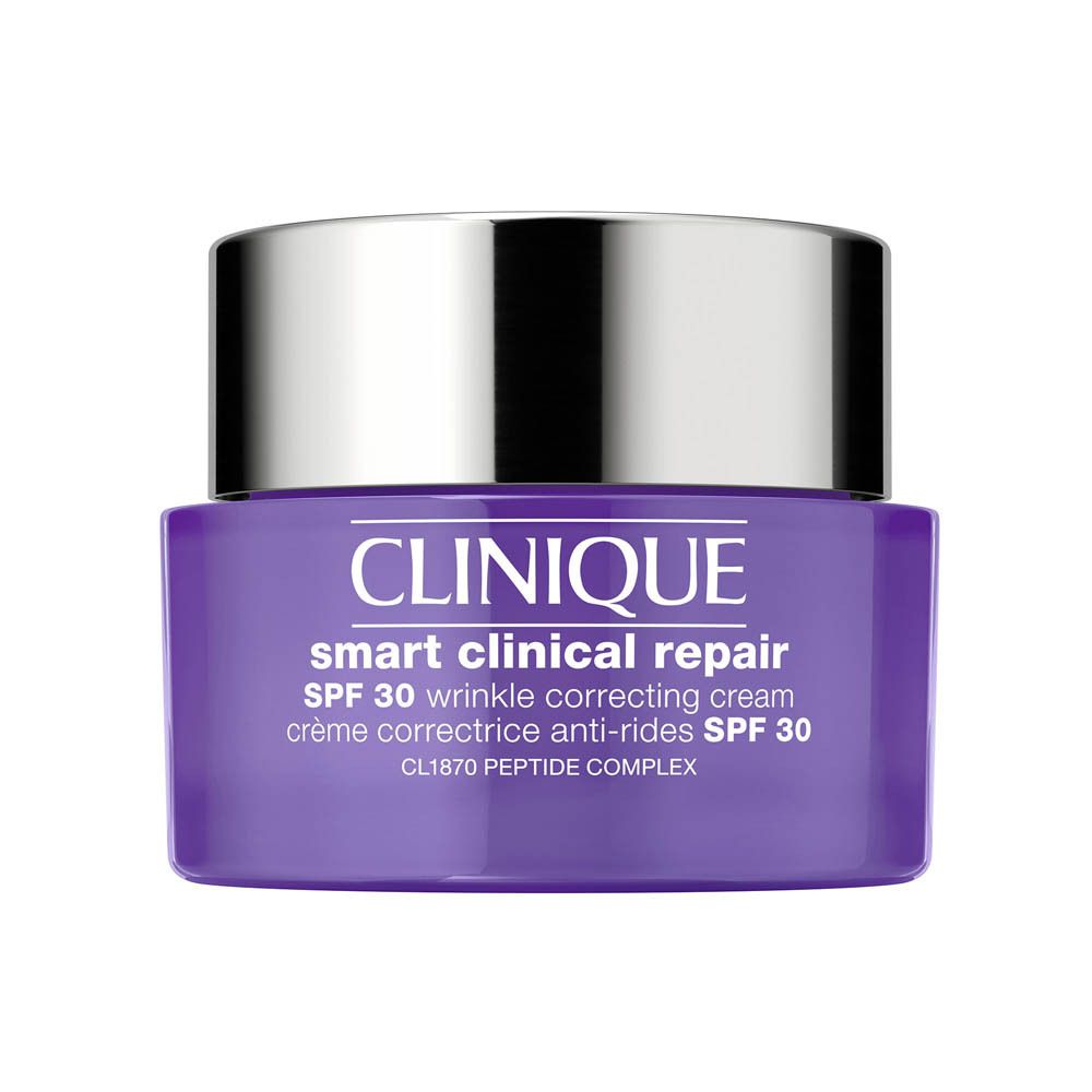 Crème correctrice anti-rides Clinique Smart Clinical Repair FPS 30 dans un pot violet avec un couvercle argenté.
