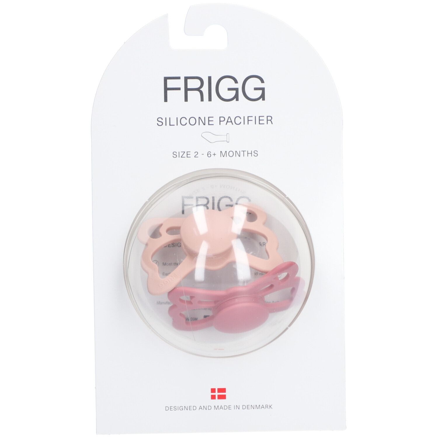 Deux sucettes en emballage. Silicone rose, forme papillon. Marque FRIGG, taille 6-18 mois.