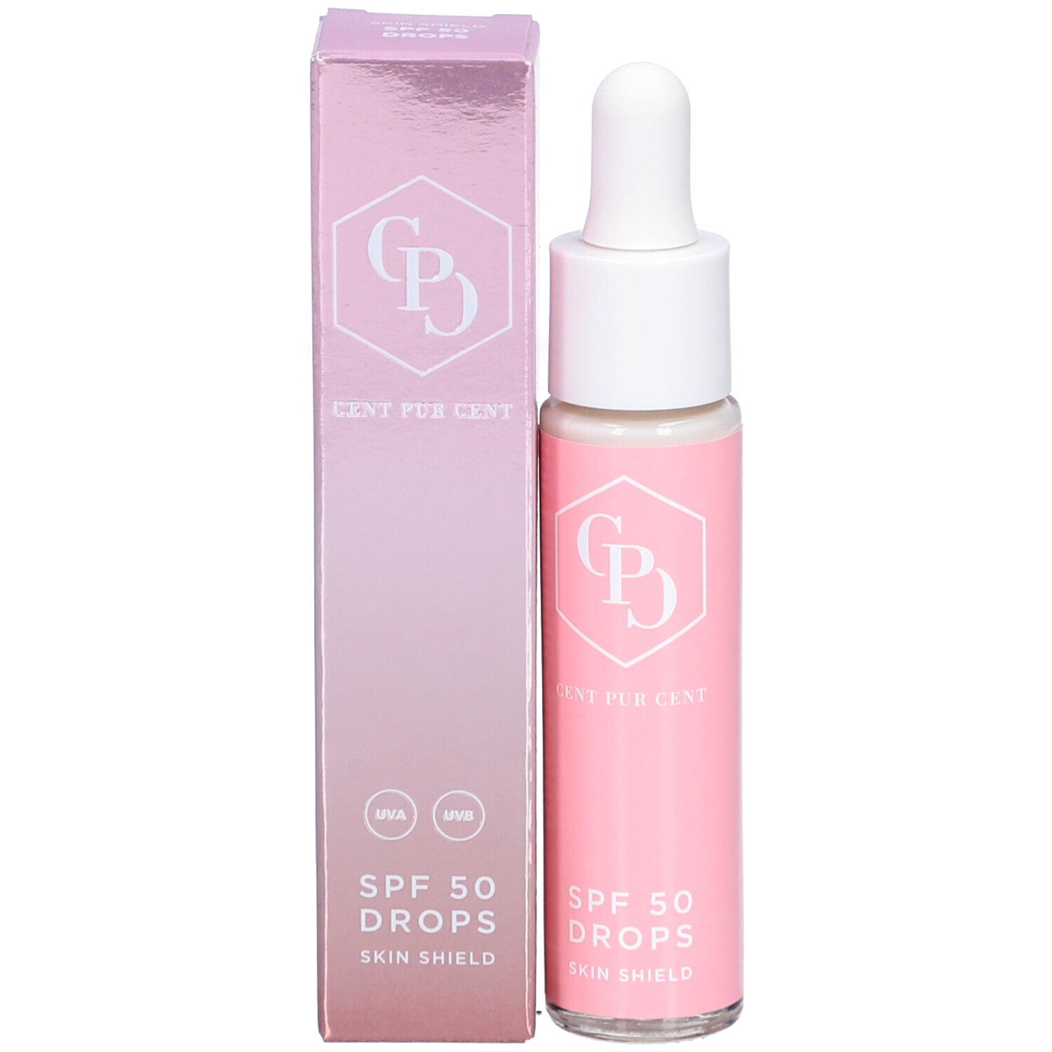 Flacon et emballage du produit. Flacon rose avec bouchon blanc et pipette. Inscription : Cent Pur Cent, SPF 50 Drops.