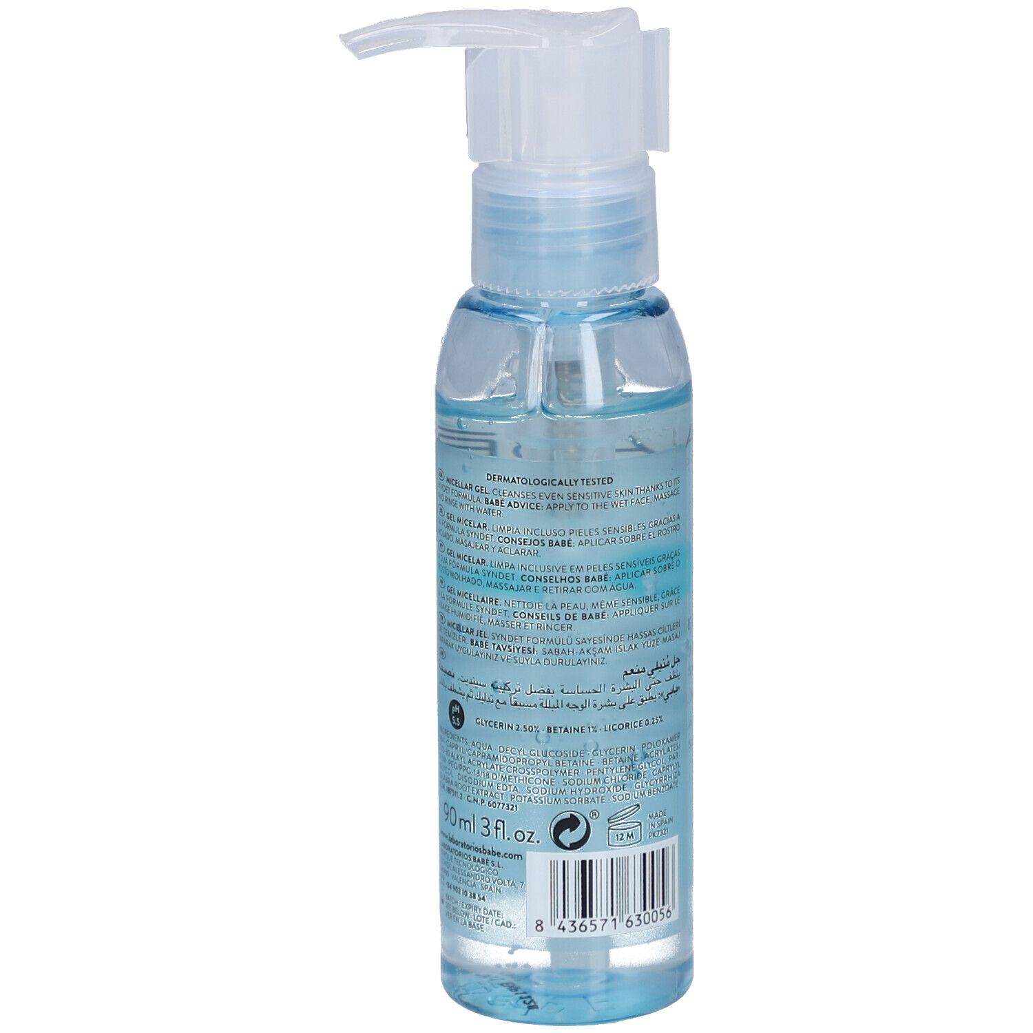 Vue arrière d'un flacon transparent avec gel bleu et pompe doseuse. Texte sur le flacon, y compris les ingrédients.