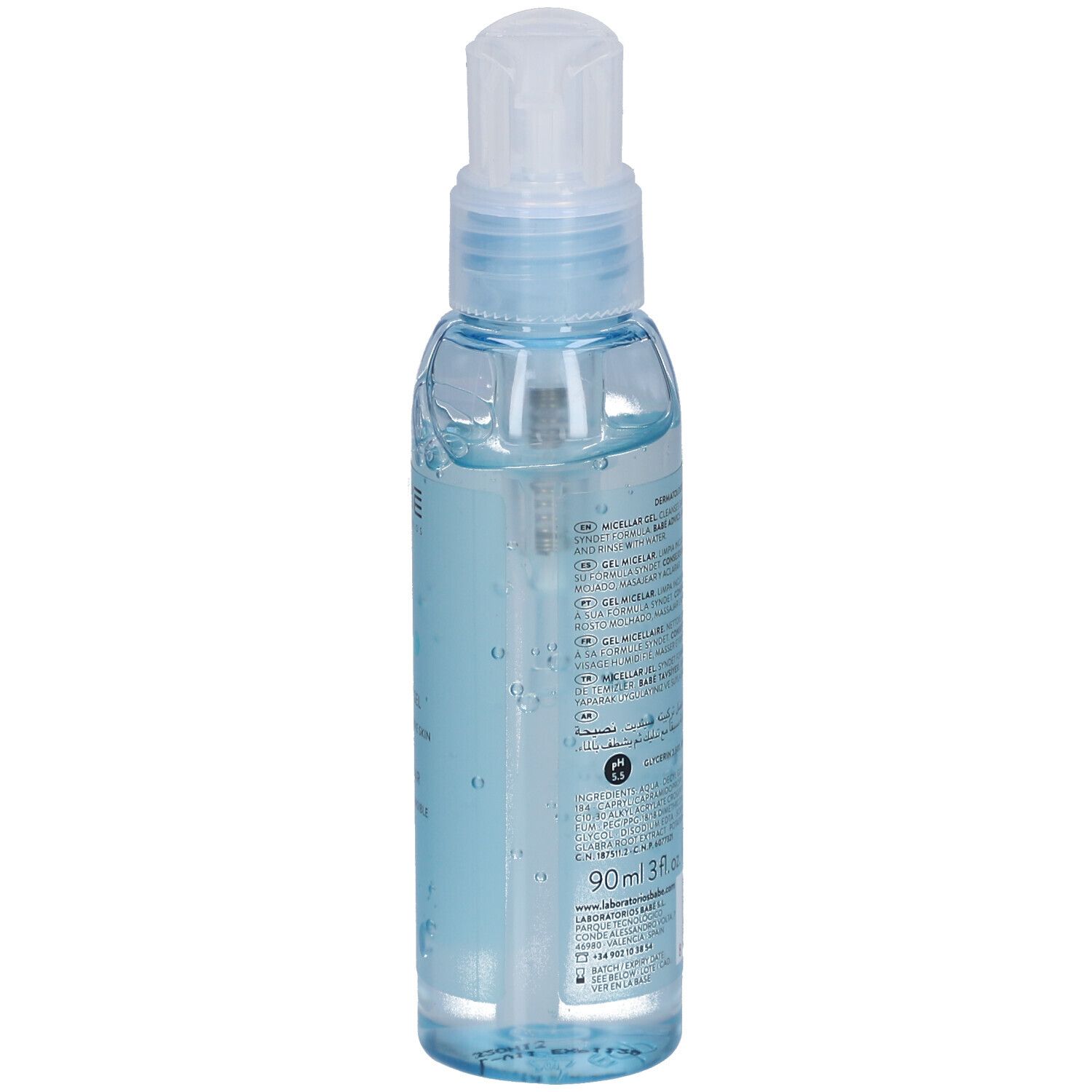 Vue arrière d'un flacon transparent avec gel bleu et pompe doseuse. Texte sur le flacon.
