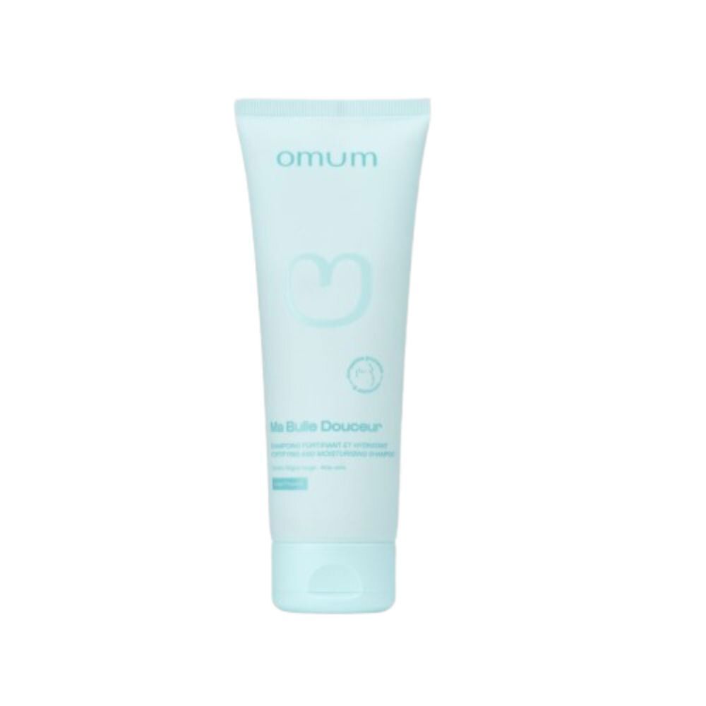 Tube turquoise. Marque "omum". Inscription "Ma Bulle Douceur". Produit pour cheveux.
