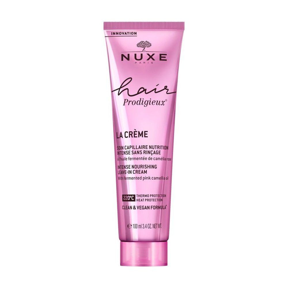 Tube de crème sans rinçage Nuxe Hair Prodigieux, rose, avec informations produit.