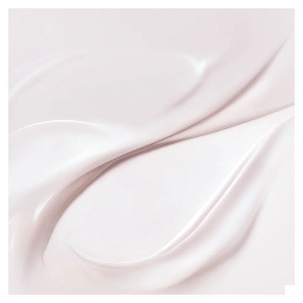 Arrière du tube de crème sans rinçage Nuxe Hair Prodigieux avec ingrédients et certifications.