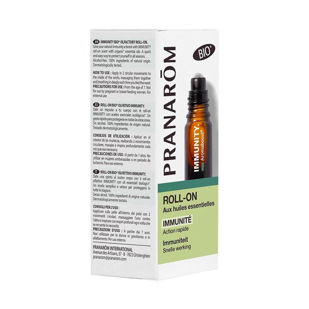 Flacon roll-on et boîte. Inscriptions: PRANARÔM, IMMUNITY, Roll-On, BIO. Flacon en verre ambré.